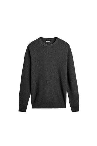 Front view of a dark grey knitted jumper with a round neck and long sleeves