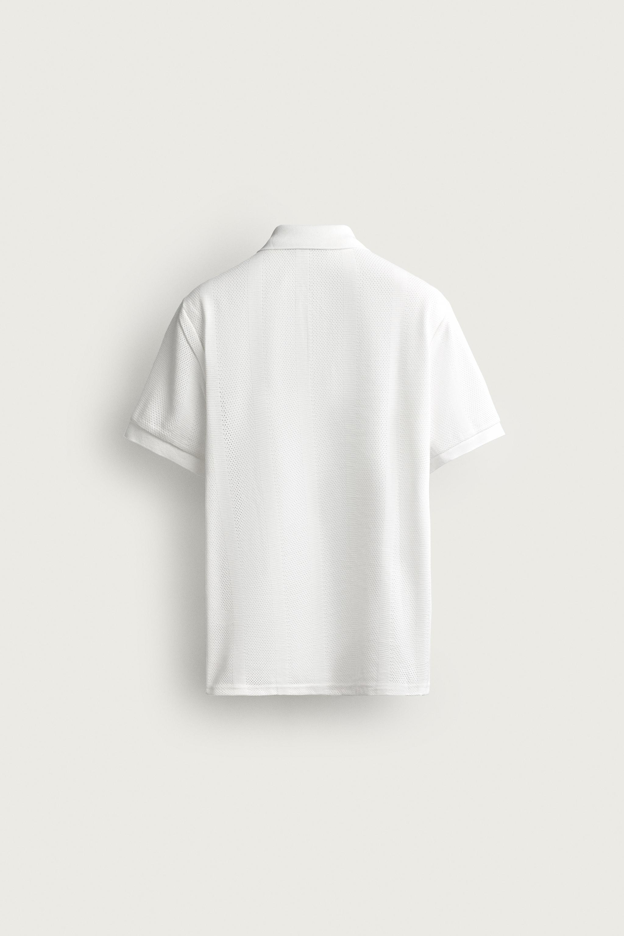 POLO REGULAR FIT EN JACQUARD À RAYURES