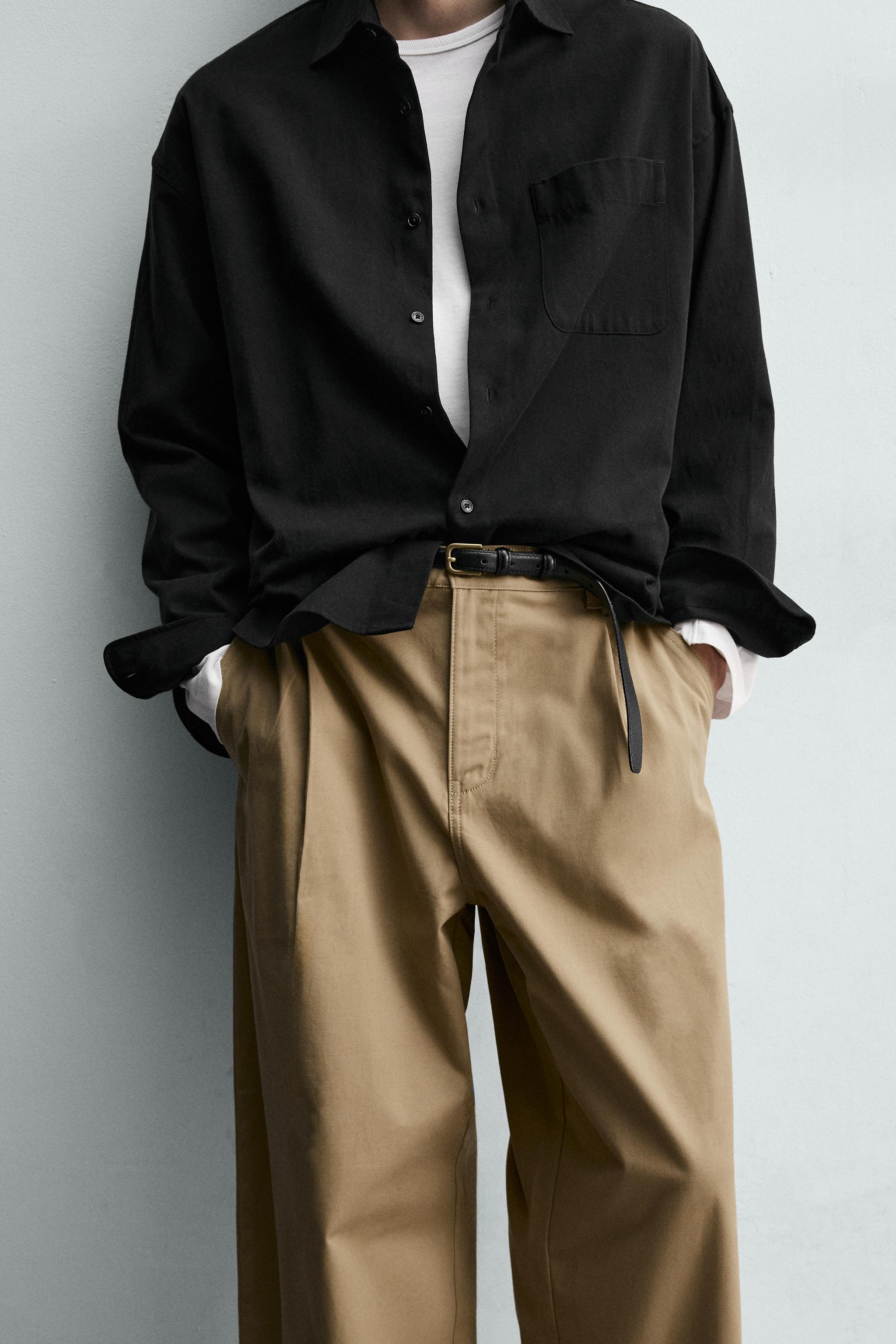 PANTALON COUPE LARGE À PLIS
