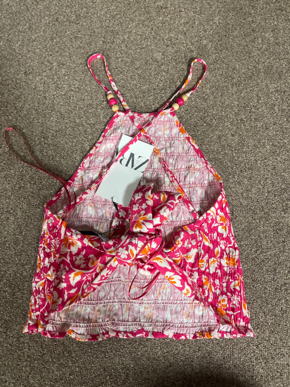 TOP HALTER ESTAMPADO CUERPO ELÁSTICO
