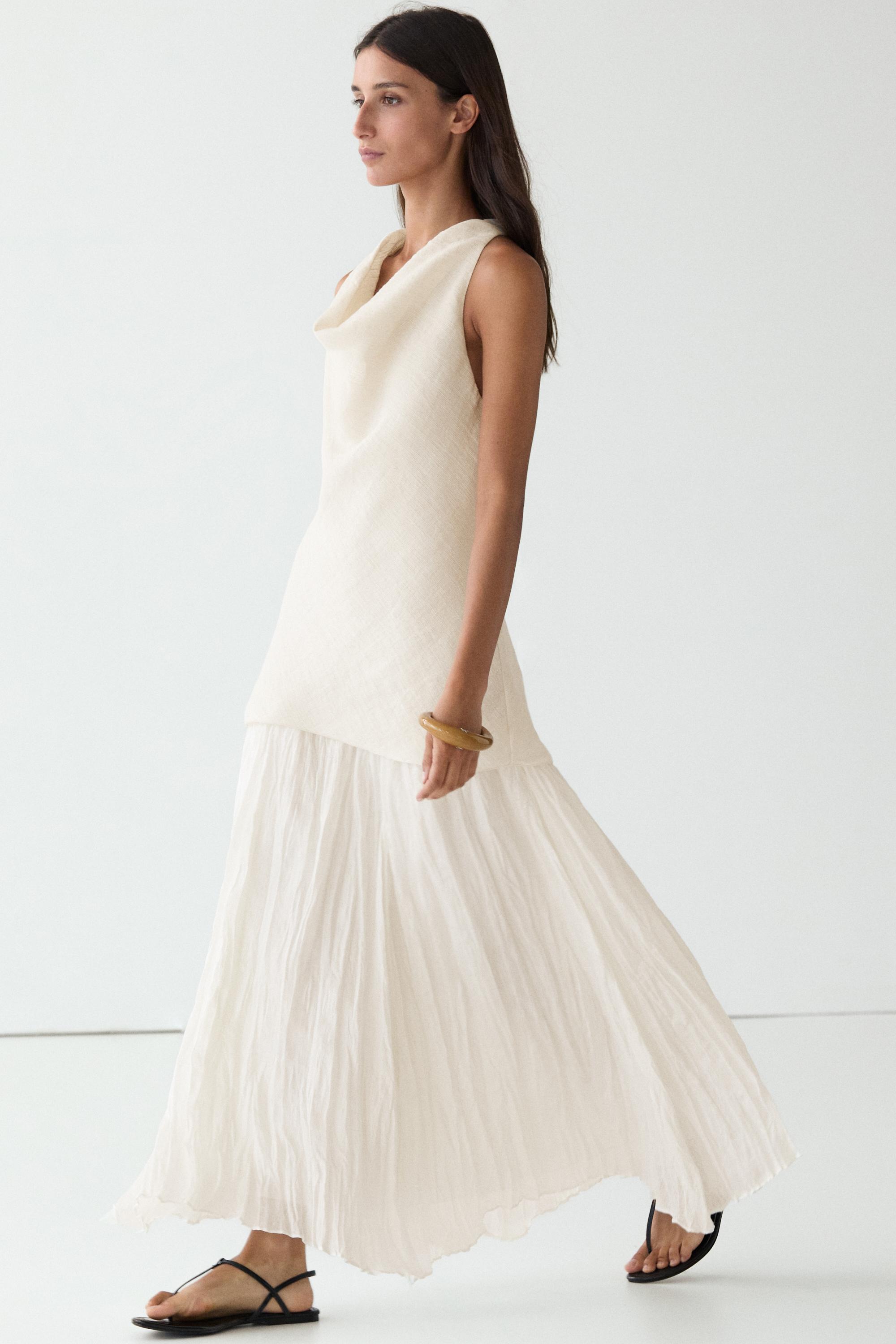 Combined flowing pleated linen dress