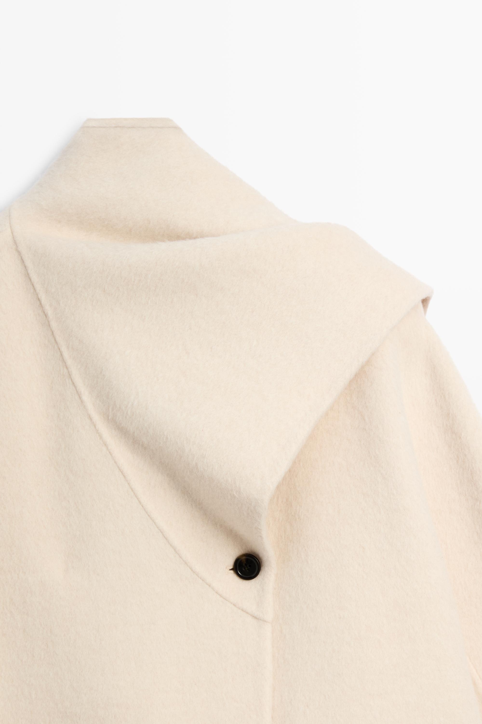 Short coat with scarf detail