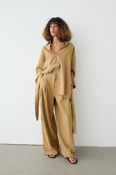Pantalon wide leg à pinces - Moutarde de Zara