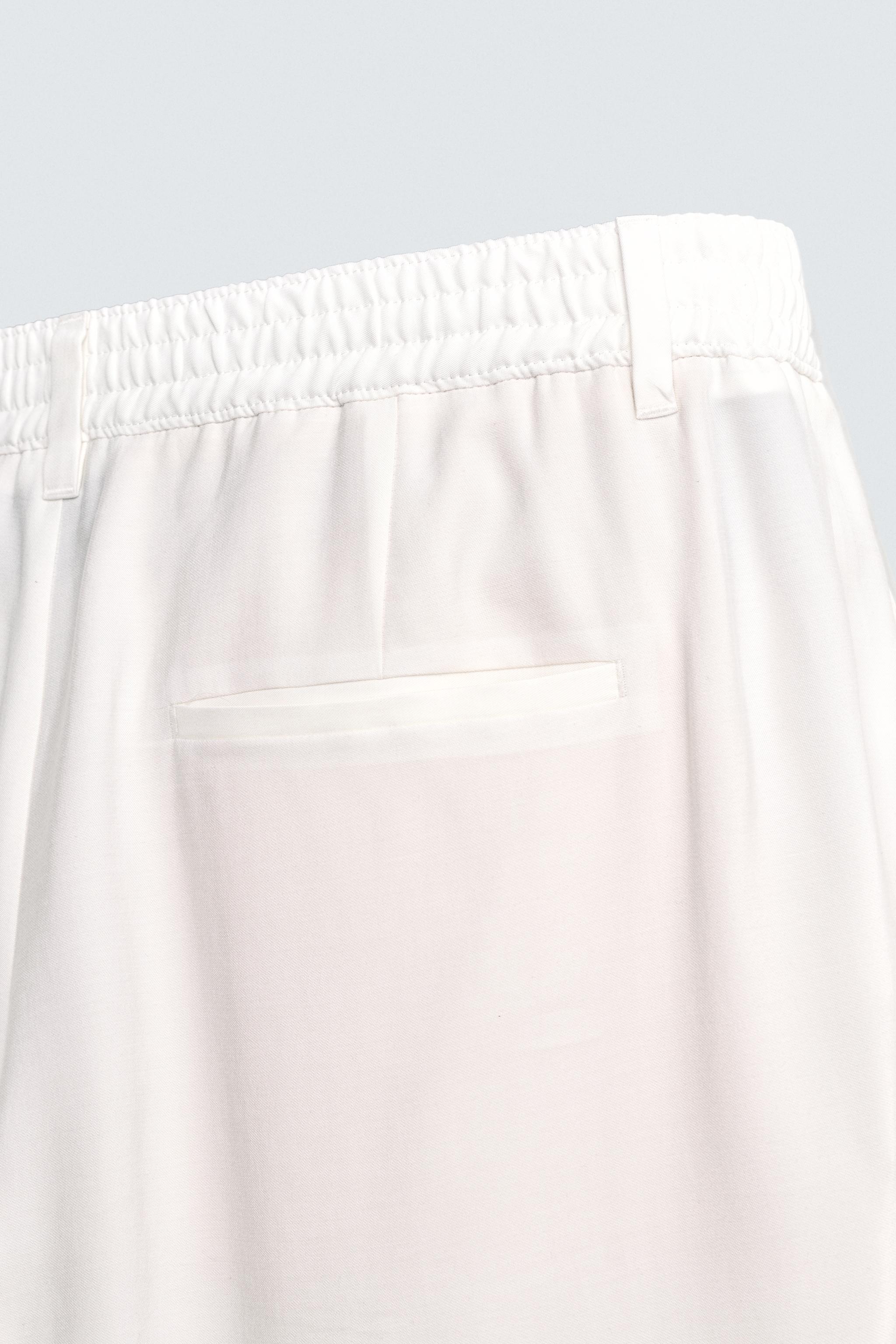 PANTALON COUPE DÉCONTRACTÉE PLIS