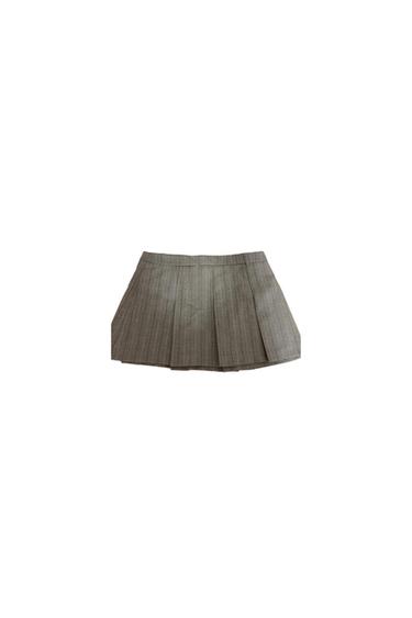 Grey pleated mini skirt with a vertical striped design on a white background.