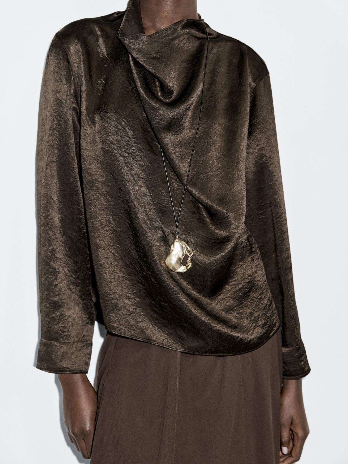 Flowing blouse with draped collar