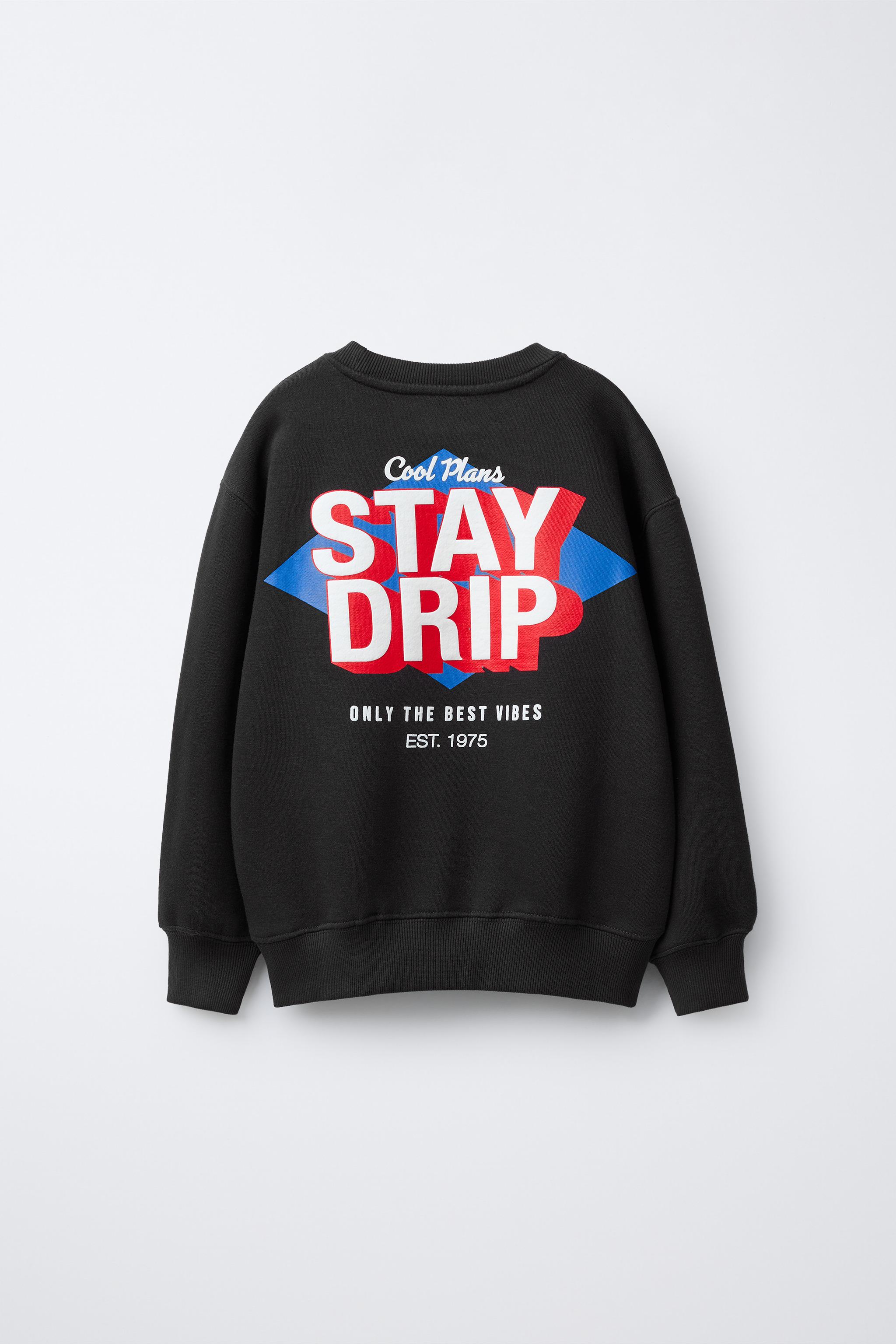 RAISED TEXT SWEATSHIRT