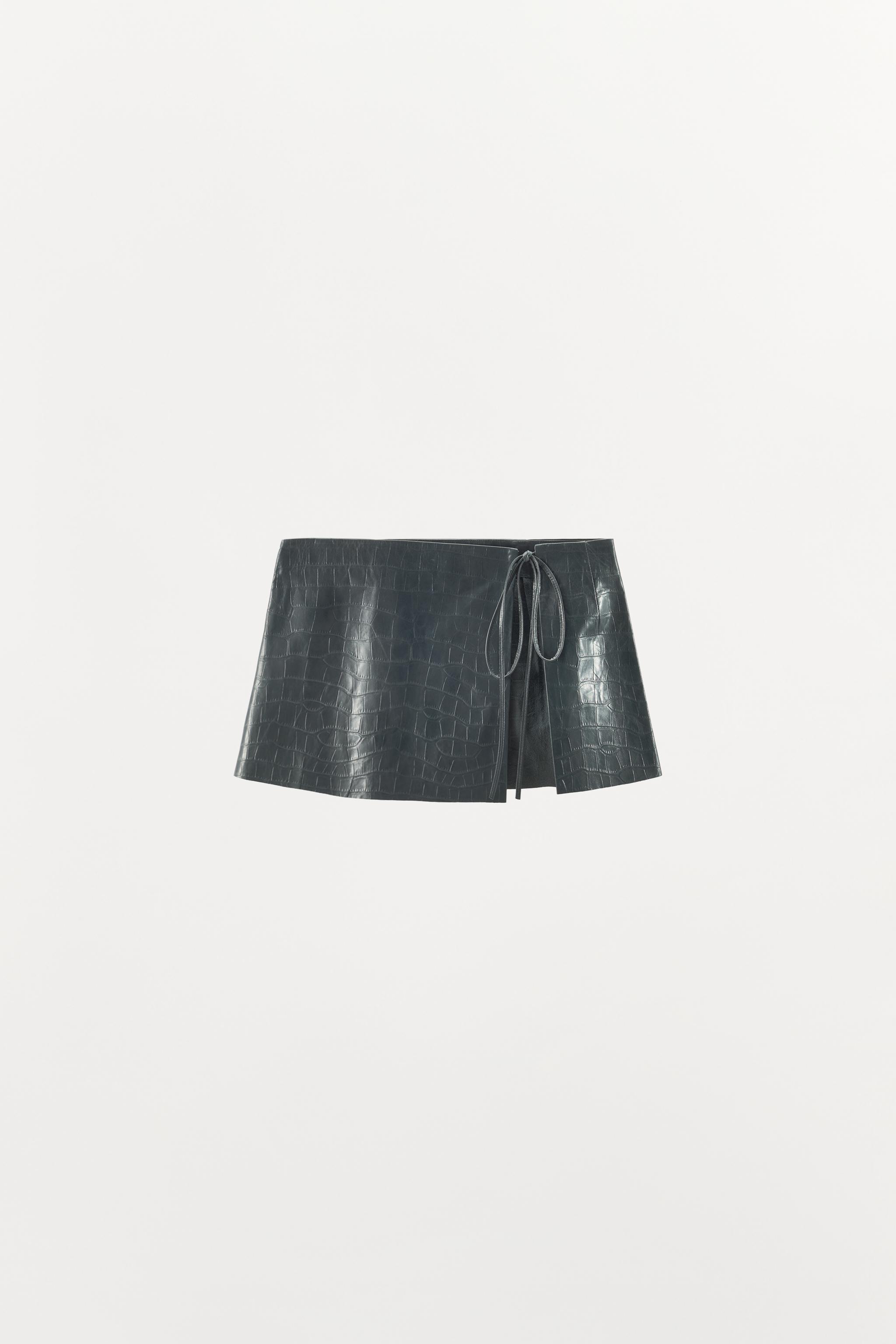 CEINTURE JUPE EN CUIR CISELÉ 100%