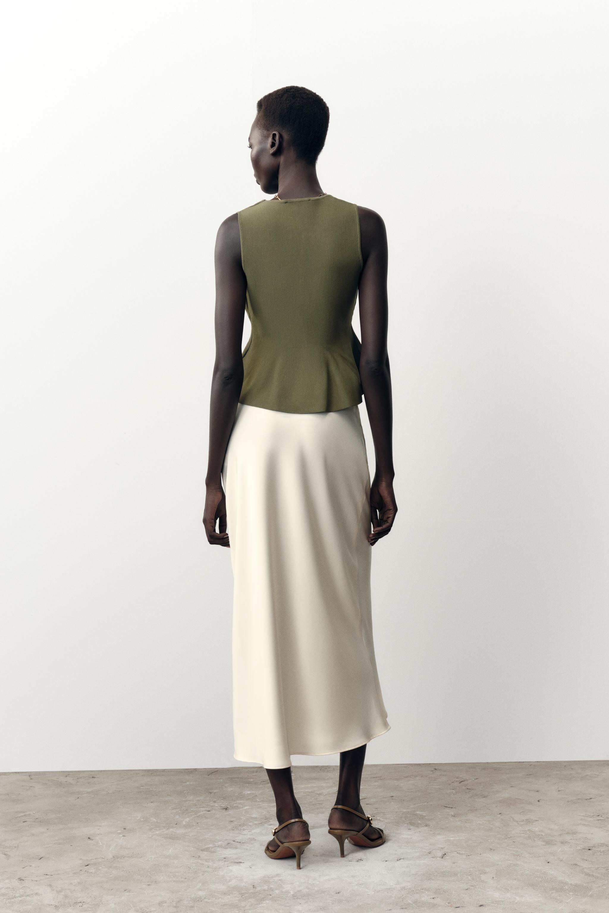 PEPLUM KNIT TOP