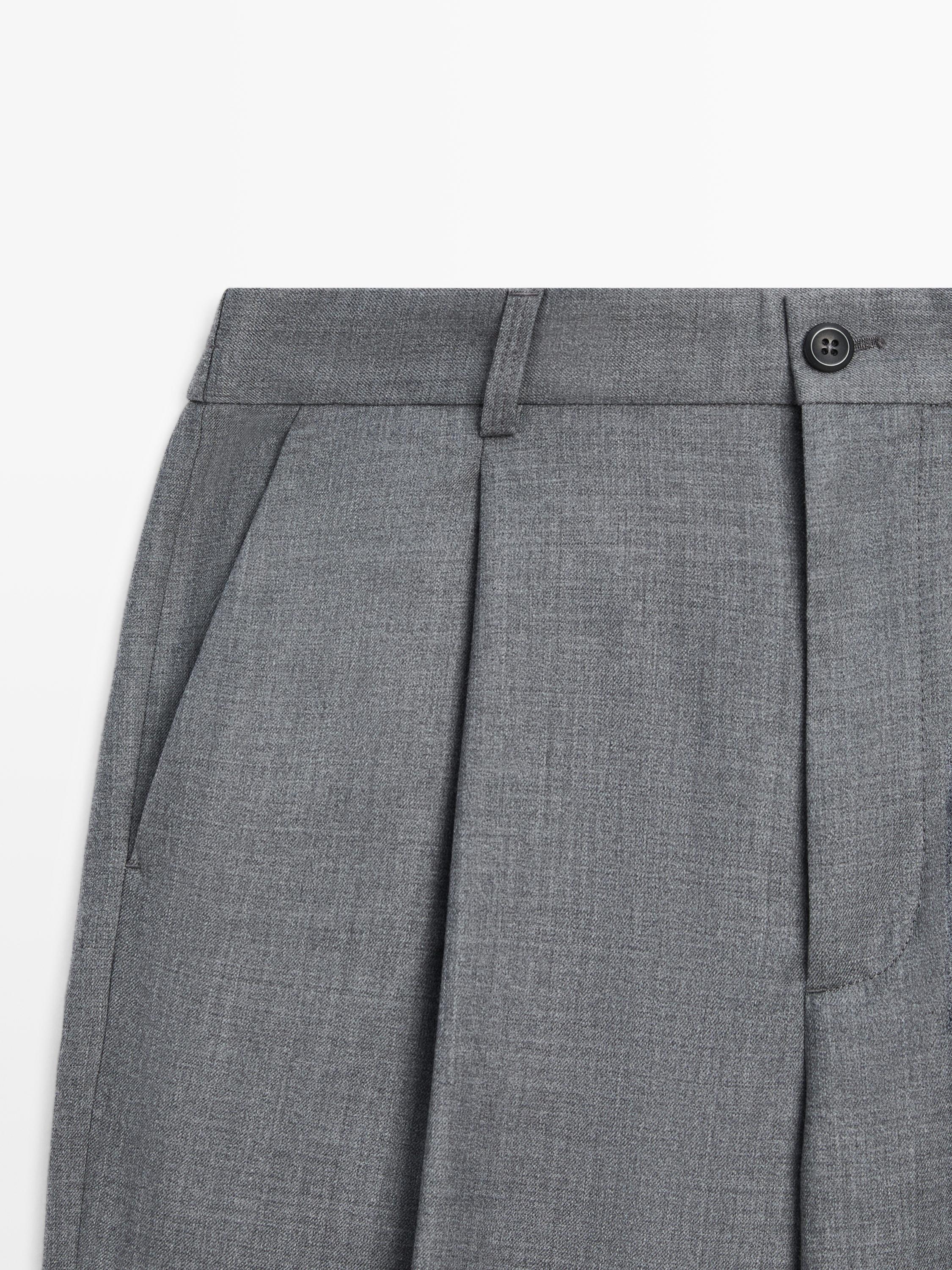 Pantalon relaxed fit à pinces en laine froide