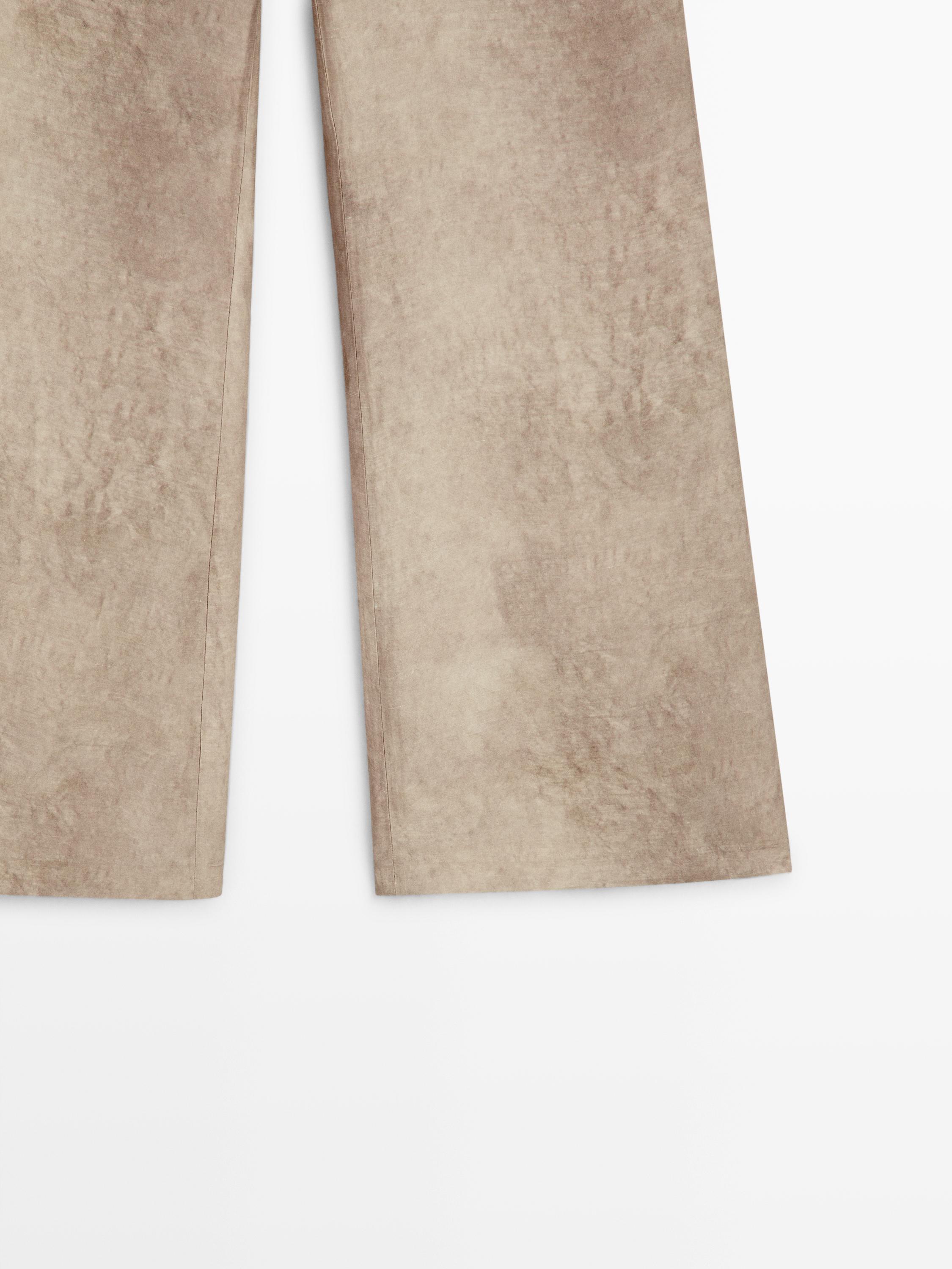 Distressed-effect flowing trousers