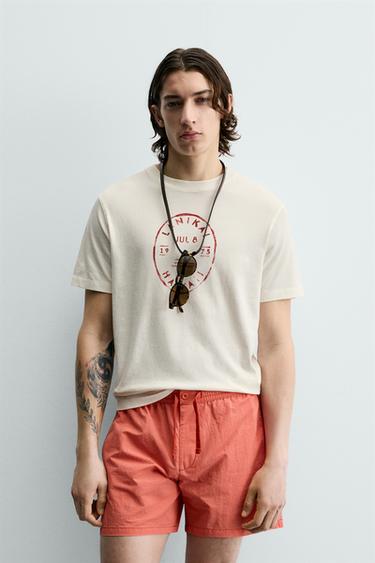 ФУТБОЛКА С ГРАФИЧЕСКИМ ПРИНТОМ «ГАВАЙИ» — ЭКРЮ от Zara