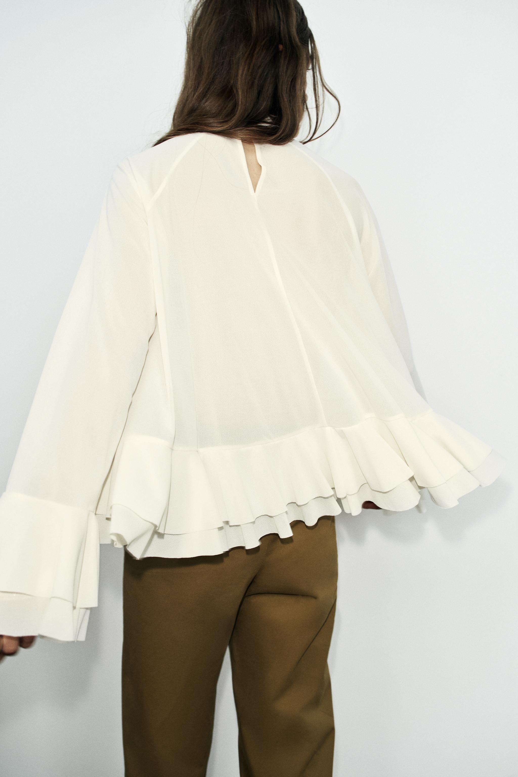HIGH-NECK RUFFLE TOP — Ecru