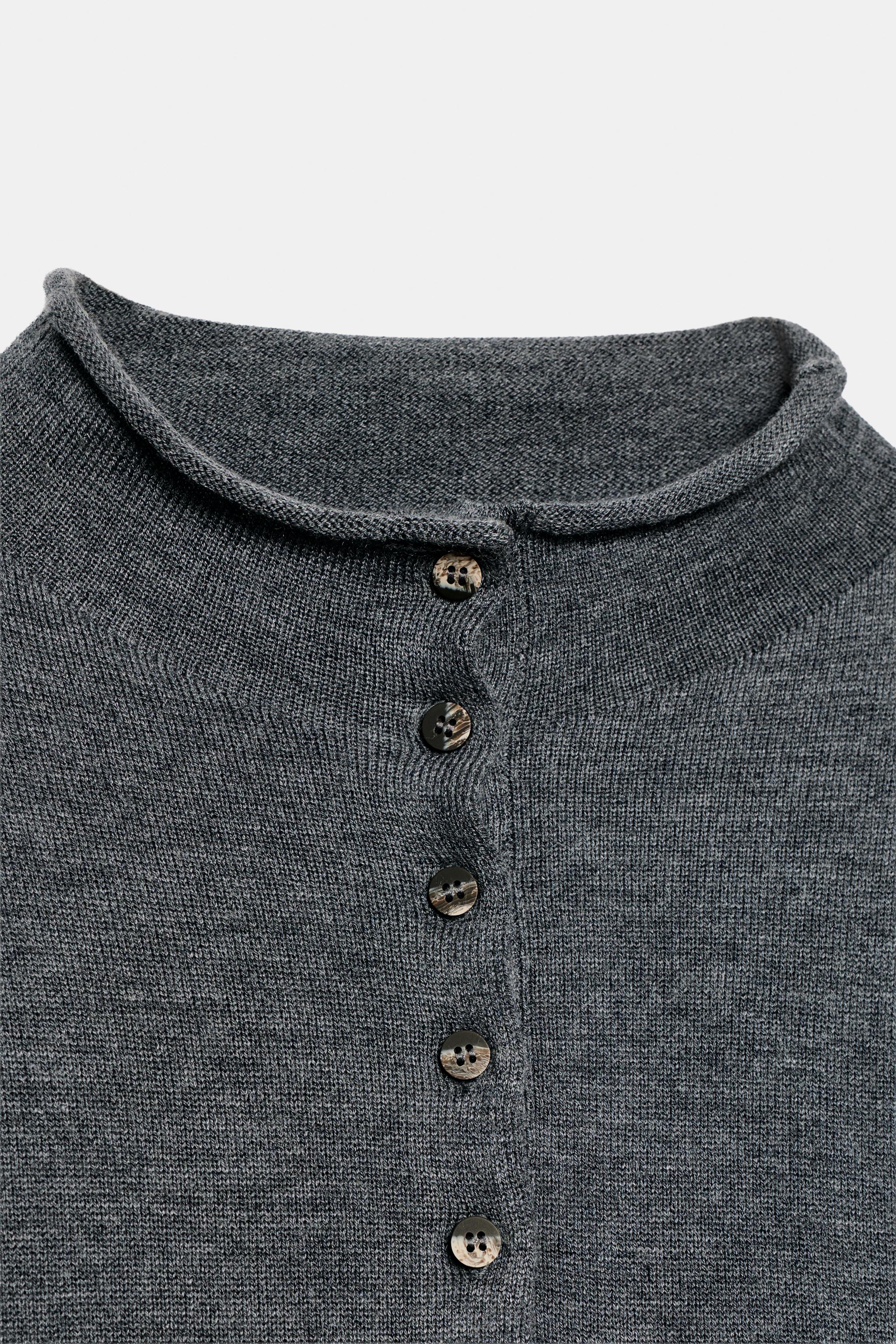 BUTTONED HIGH-NECK SWEATER