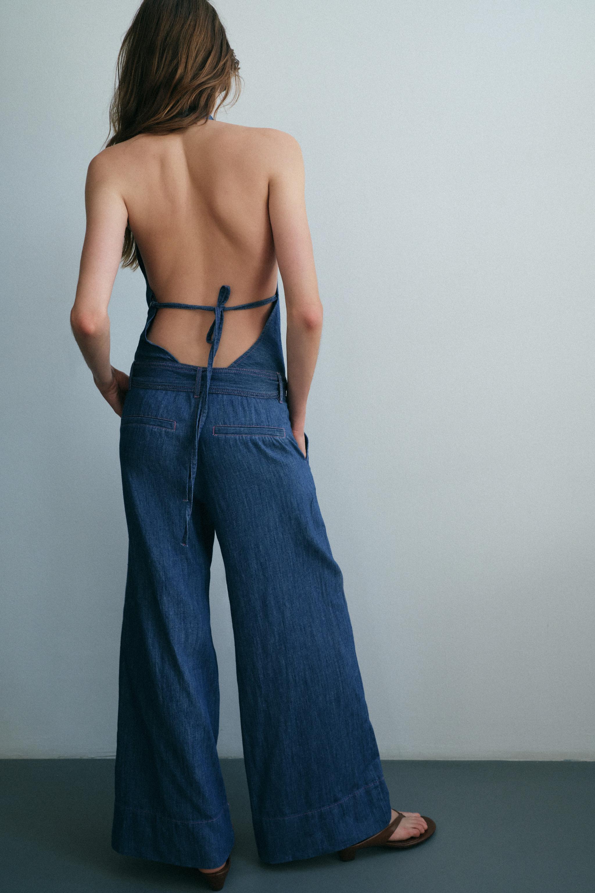 OPEN BACK BELTED HALTER JUMPSUIT