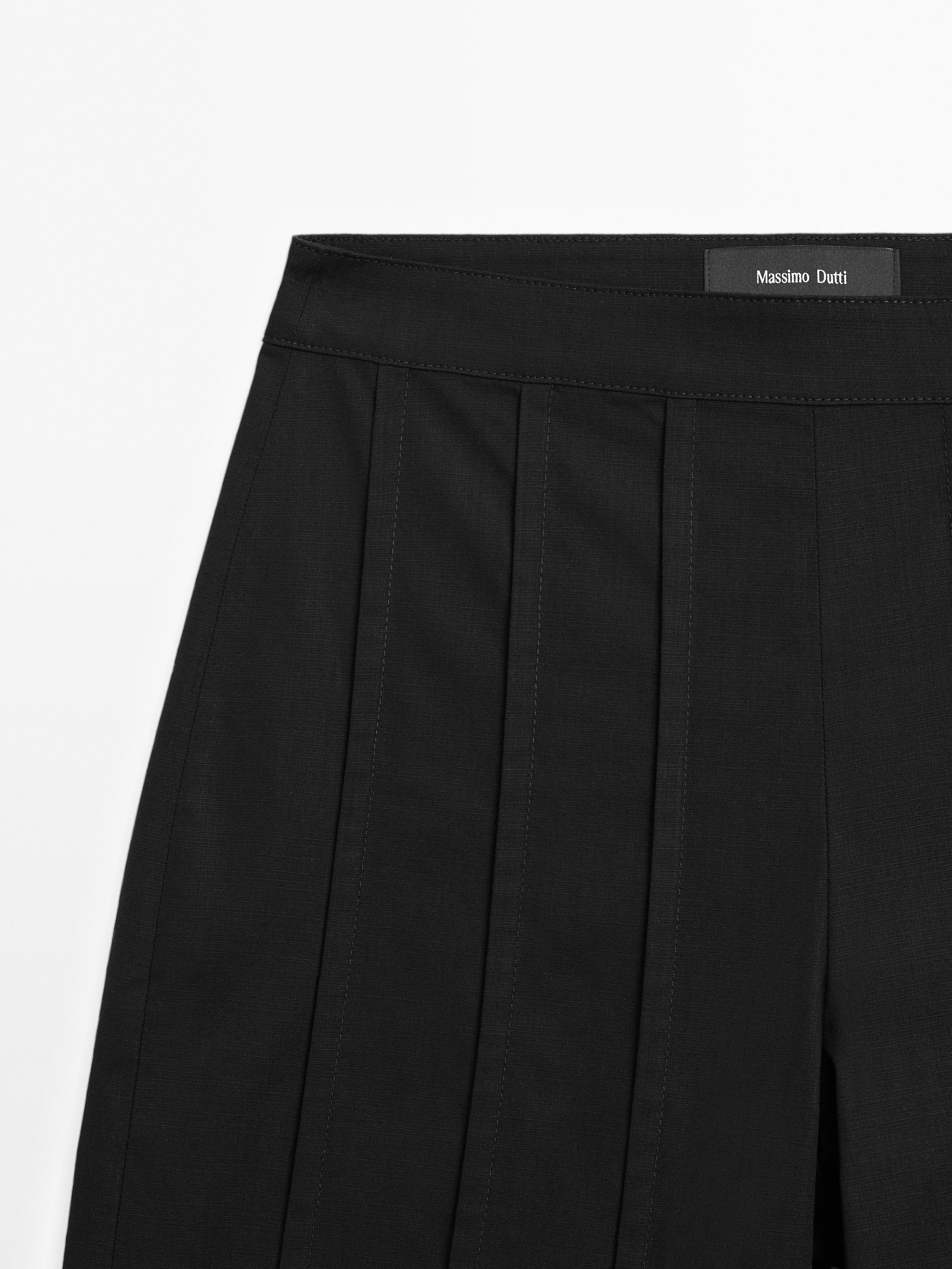 Pantalon large coutures apparentes