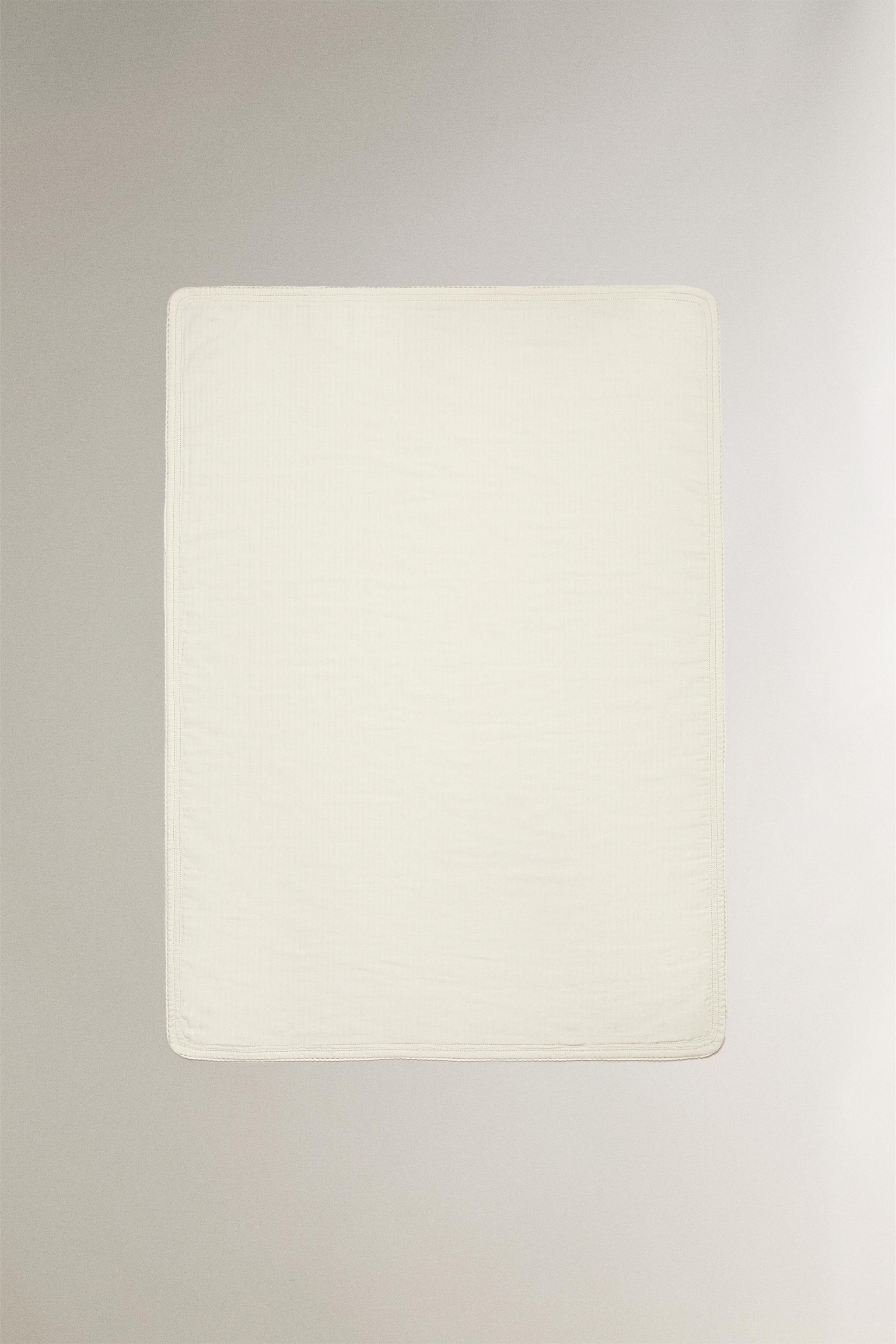 CHILDREN’S MUSLIN BLANKET WITH LACE TRIM — Ecru