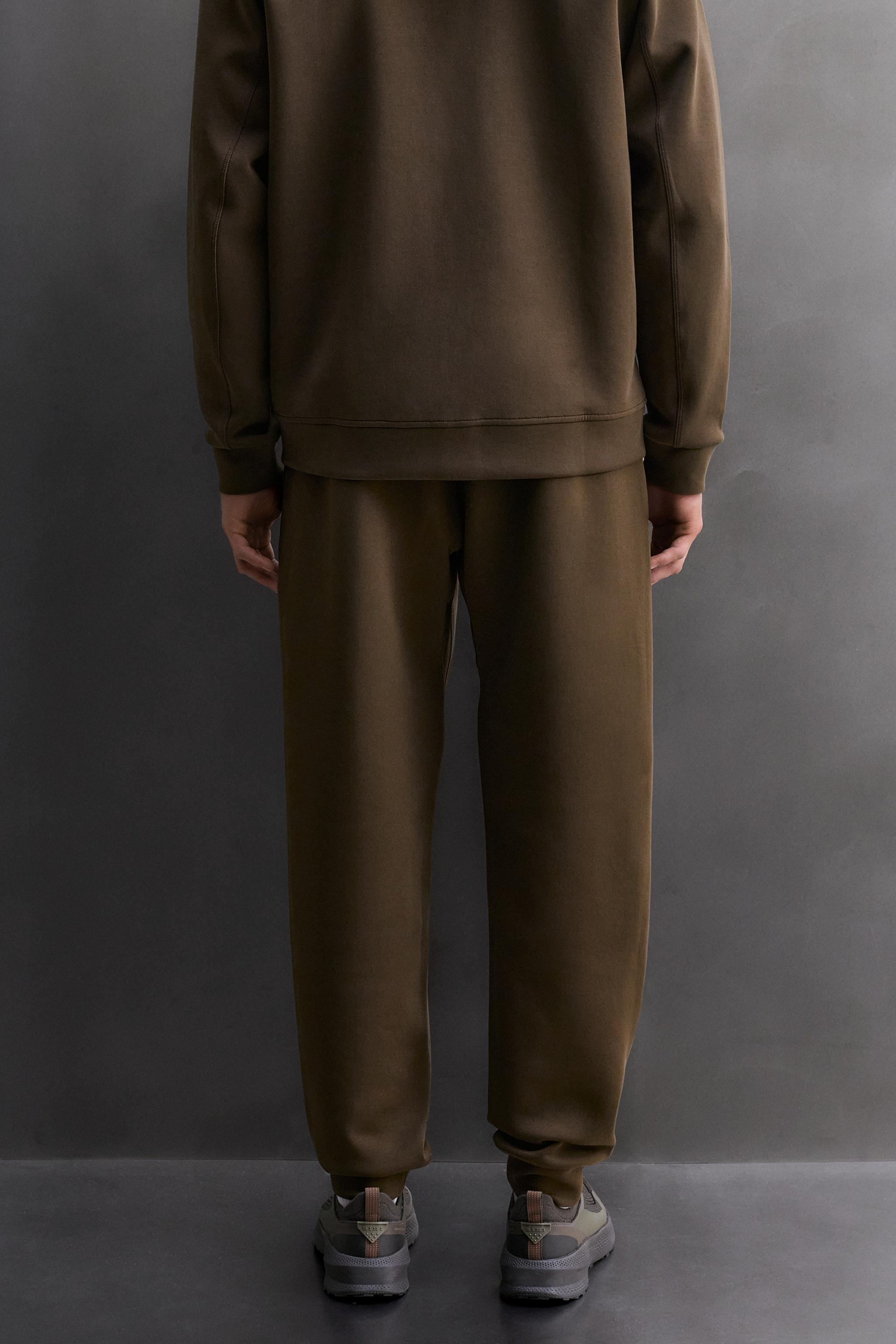 PANTALON TECHNIQUE À FERMETURE ÉCLAIR
