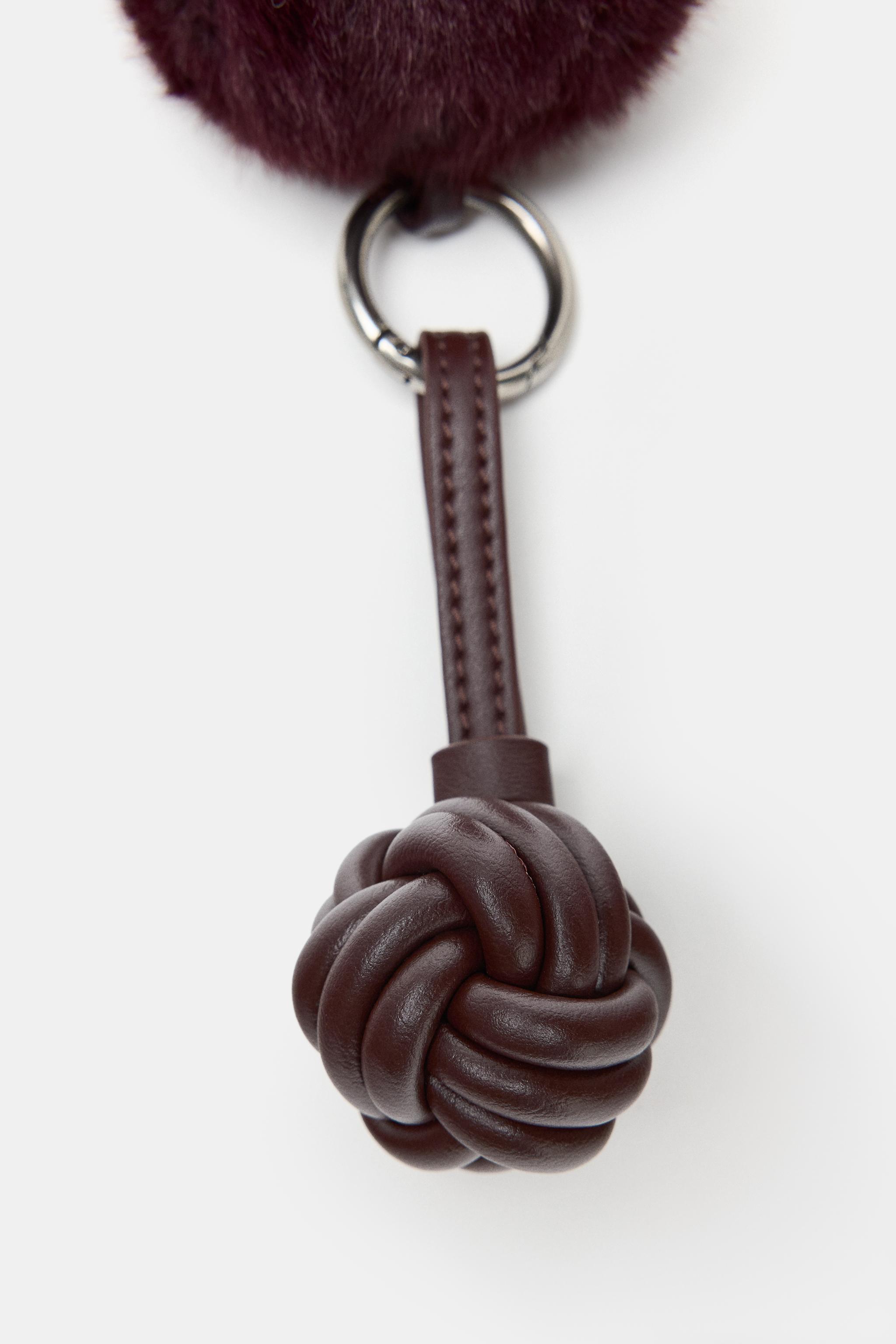 KNOT FAUX FUR CHARM