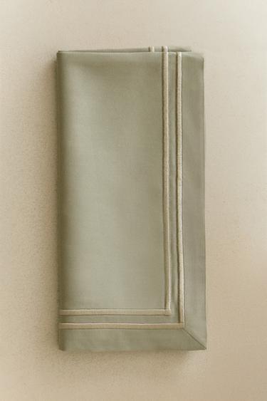 حزمة فوط مائدة ساتان بحافة مزدوجة (حزمة 2 قطعة) - مخضر الخاص بـ Zara