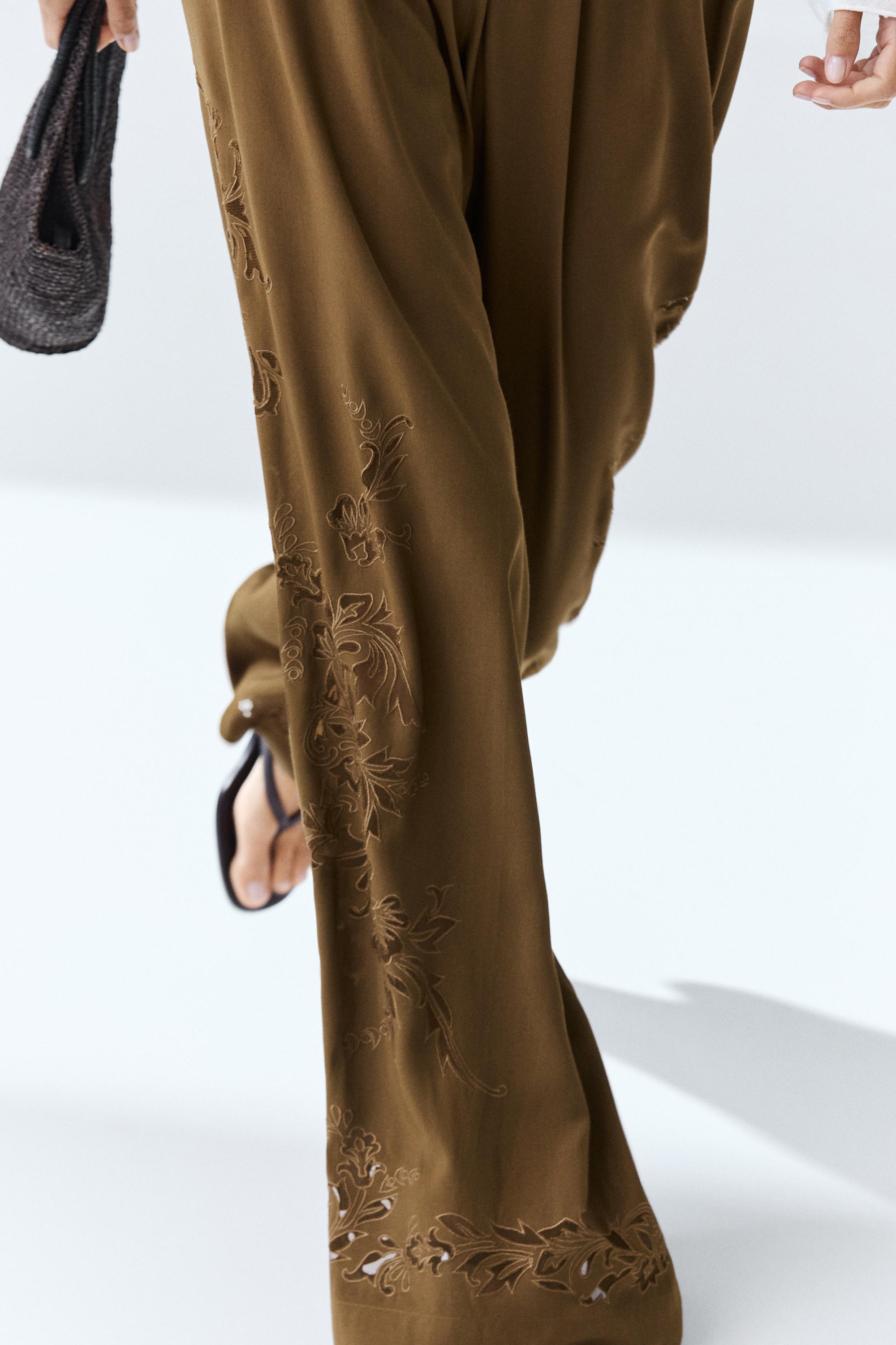 Flowing wide-leg pants with embroidery details