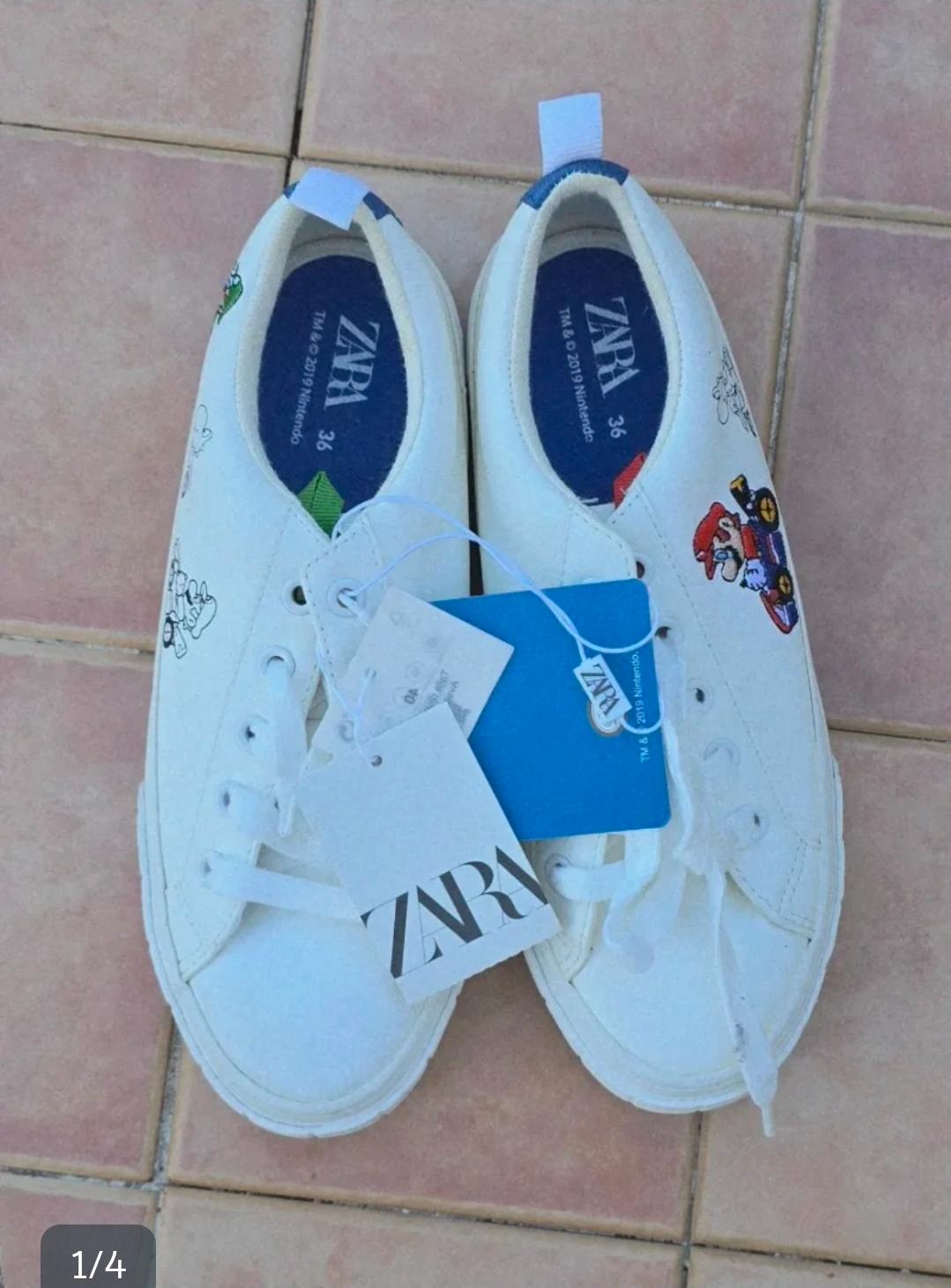 White trainers with designs and labels on tiles. Visible text: ZARA 36 TM & © 2019 Nintendo, 1/4.