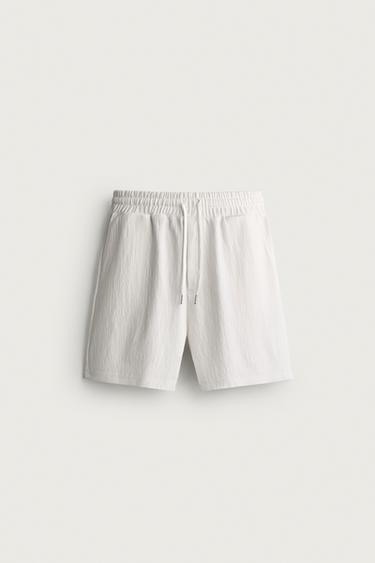 برمودا هيكلي بخصر JOGGER - أبيض مكسور الخاص بـ Zara