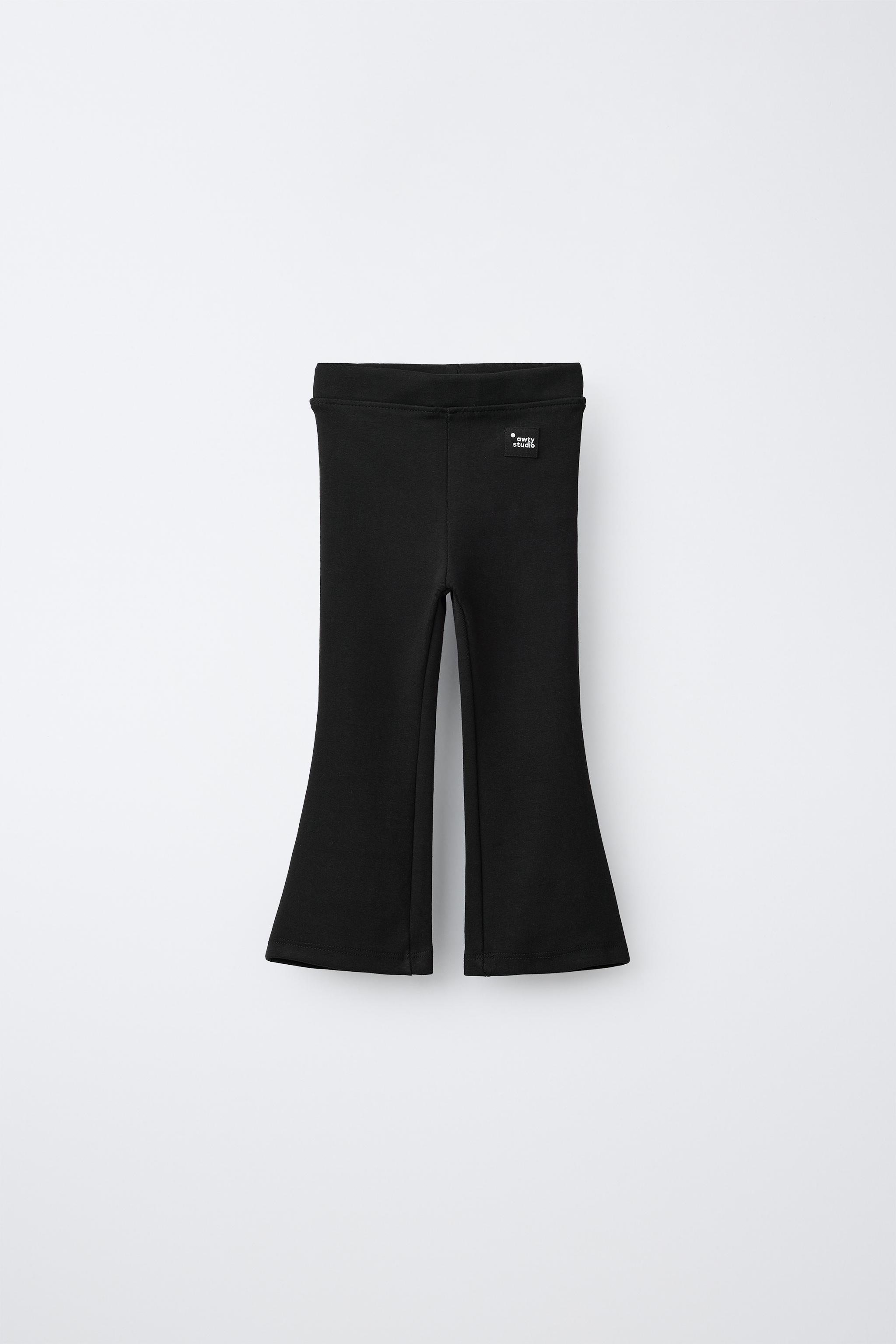 LABEL DETAIL INTERLOCK FLARE LEGGINGS
