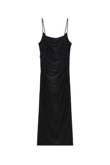 Front view of a black dress with draping and thin straps.