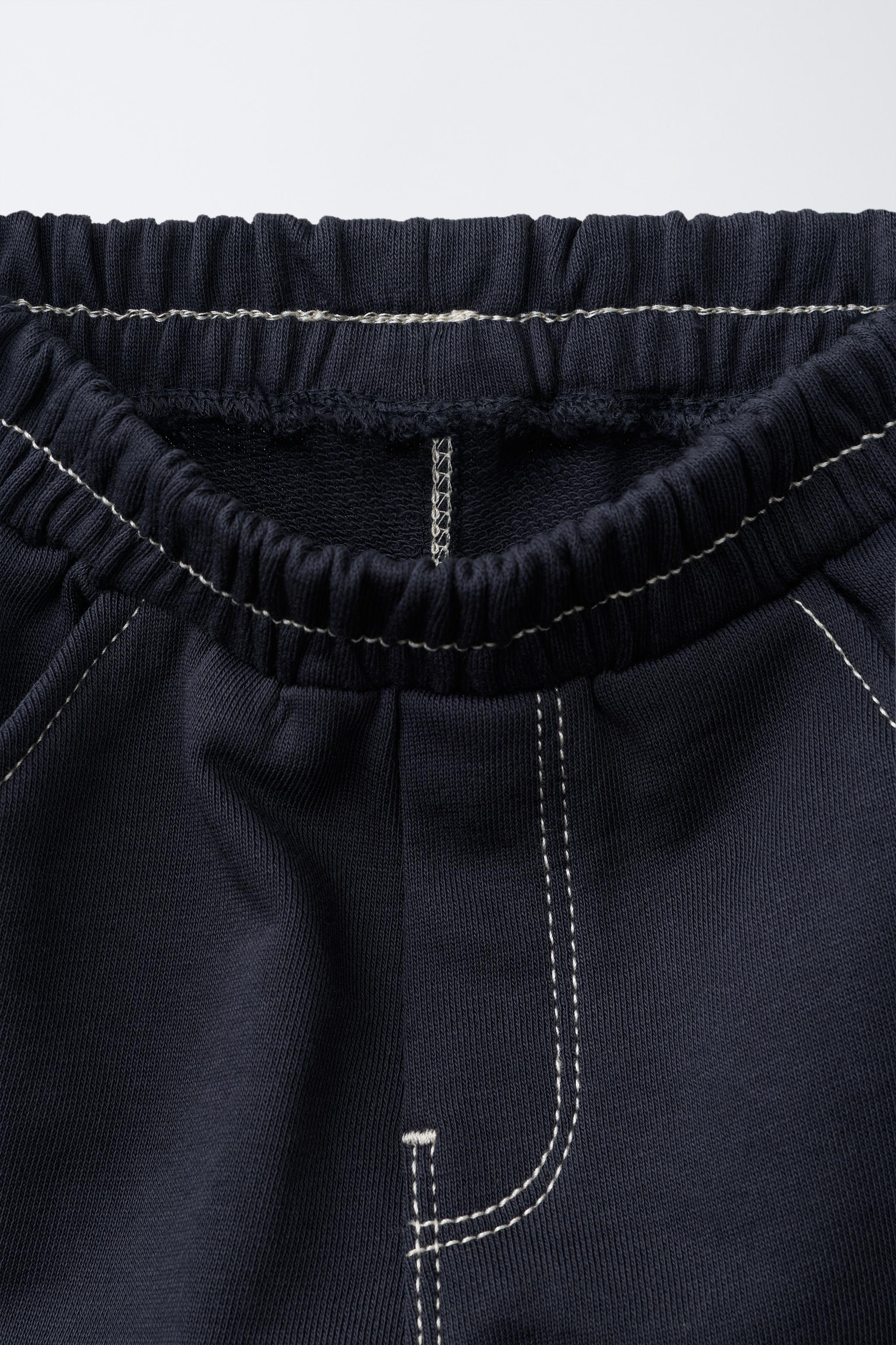 CONTRAST STITCHING FLEECE BAGGY PANTS