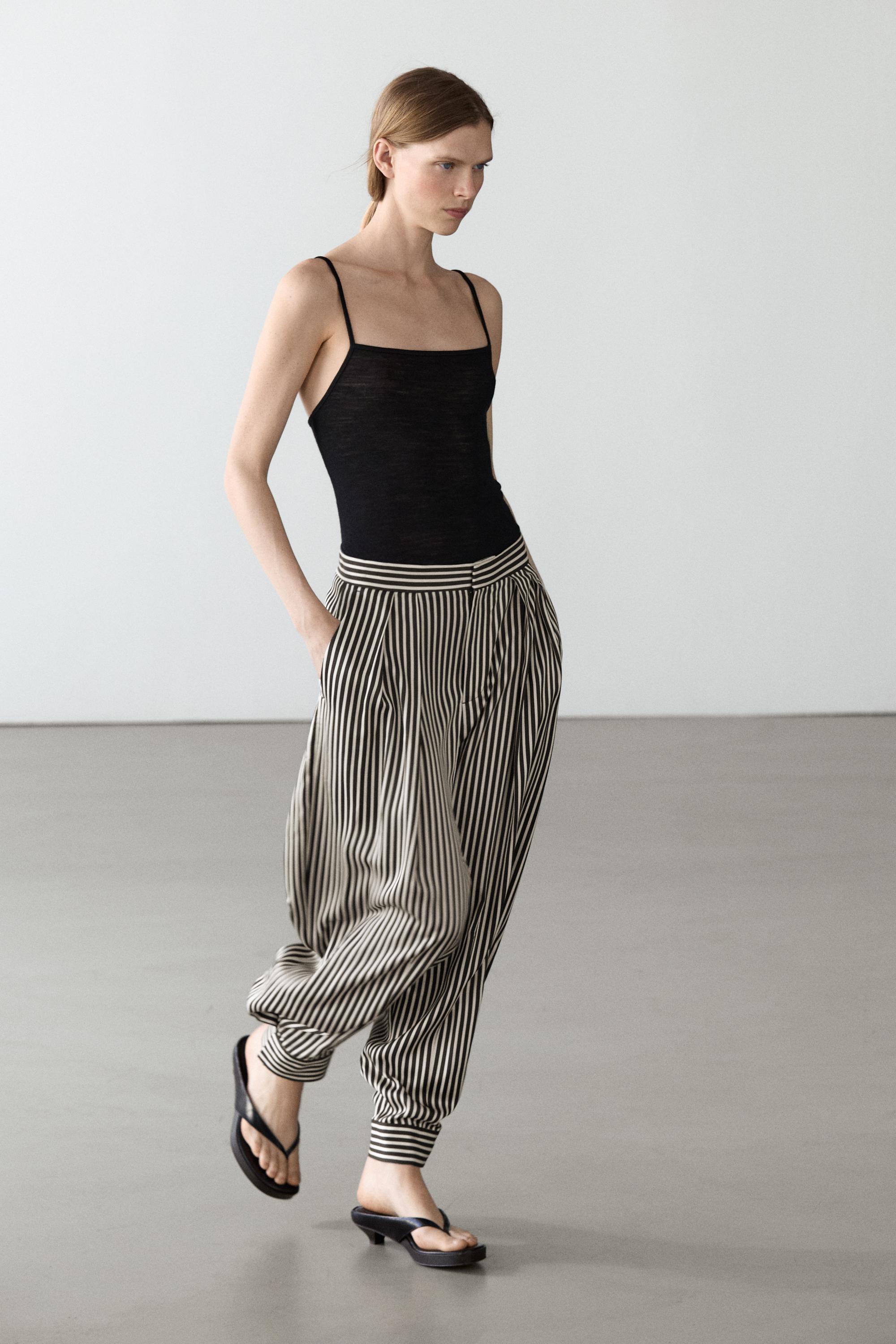 Pantalon bouffant à pinces rayé