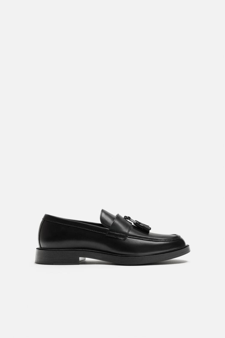 MOCASSINS EN CUIR AVEC MASQUE