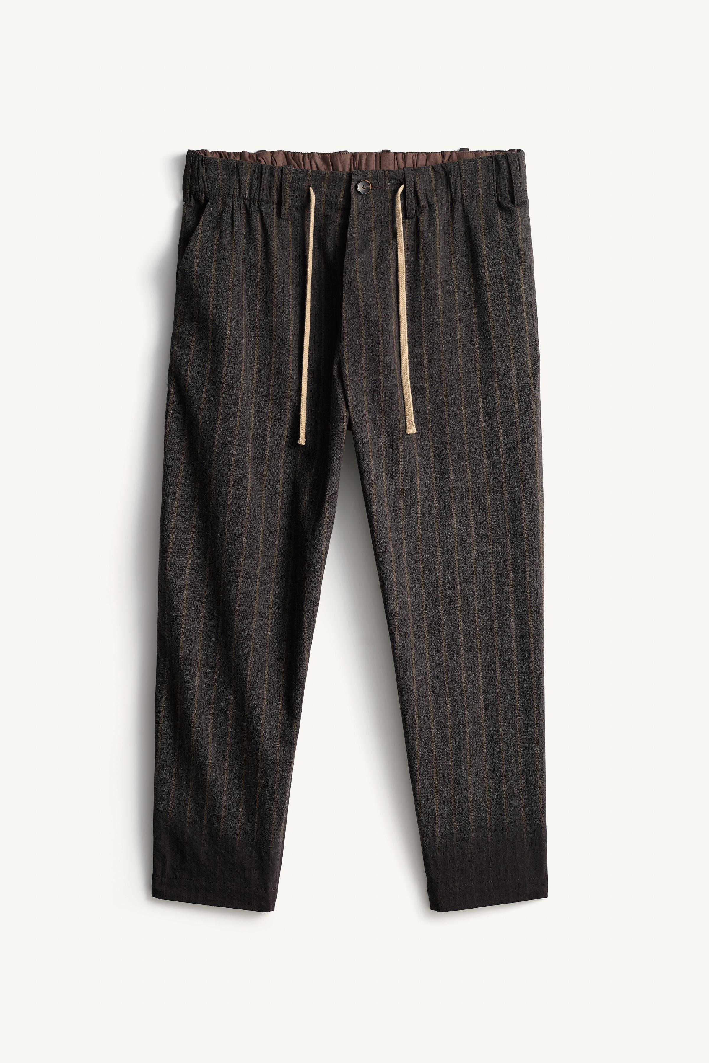 STRIPED RELAXED FIT PANTS