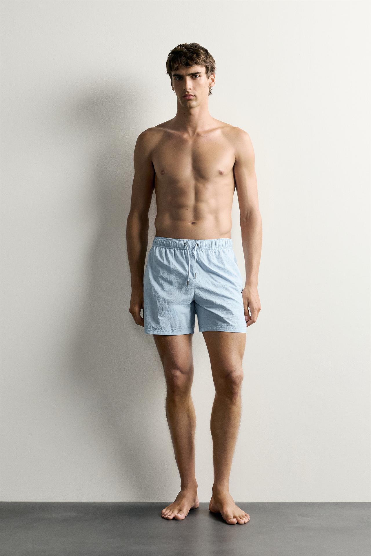 STRIPED MID-LENGTH SWIMSUIT — Sky blue