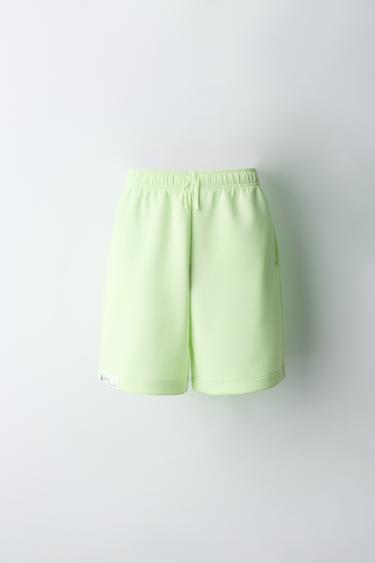 BERMUDA SPORTY NEOPRENO FLÚOR - Lima flúor de Zara