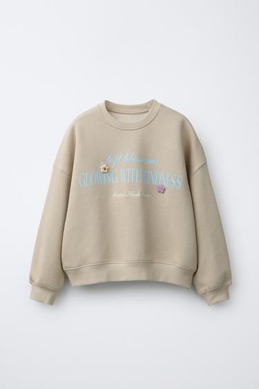 سويت شيرت بنص وزهور - مِحْمر الخاص بـ Zara - صورة 0