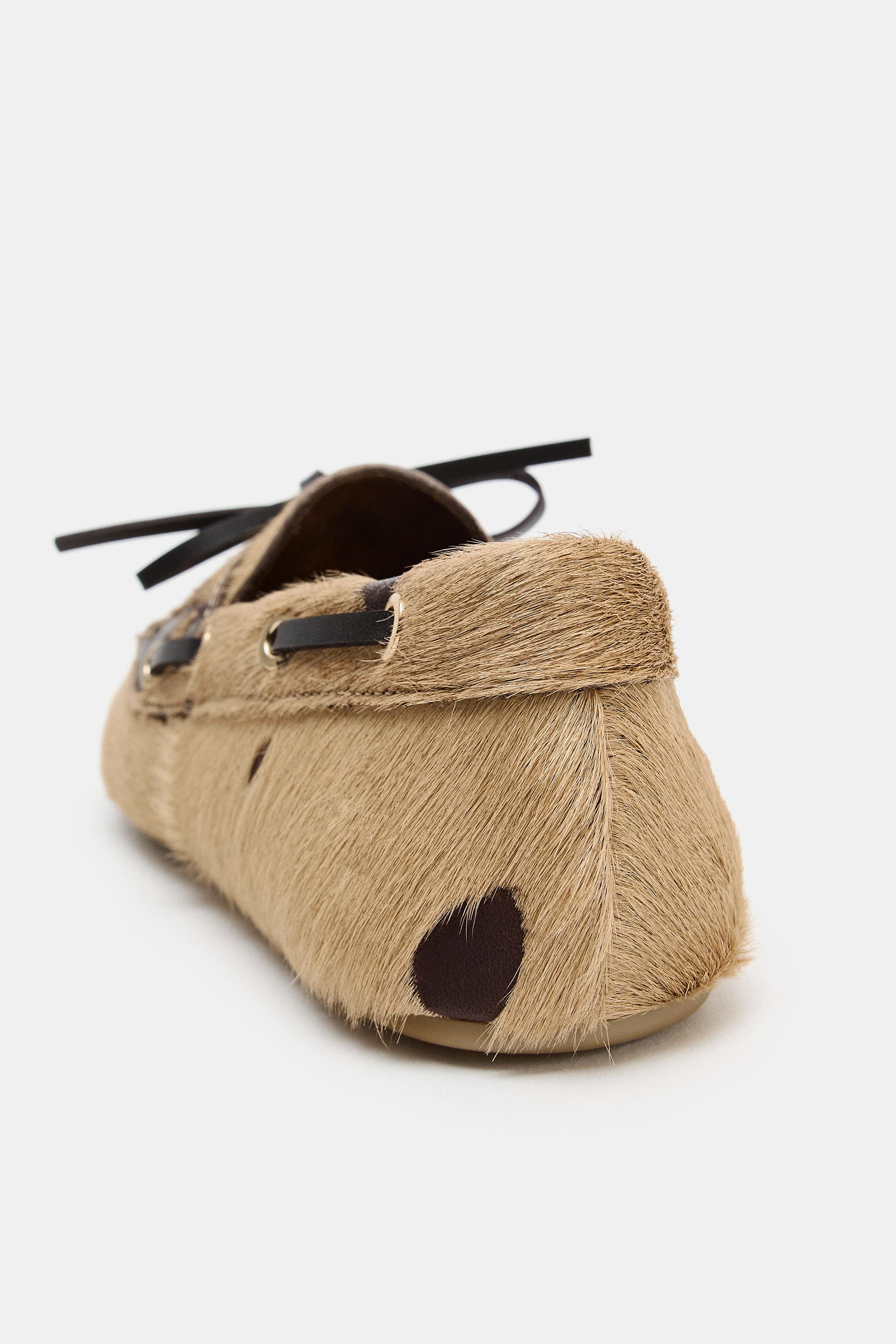 MOCASSINS EN CUIR AVEC EFFET FOURRURE ET IMPRIMÉ ANIMALIER