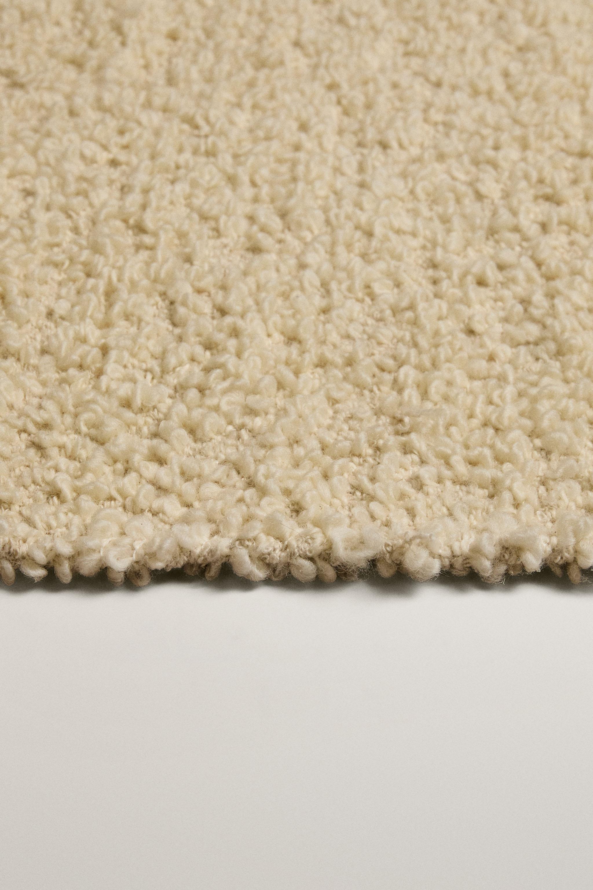 BOUCLÉ WOOL AREA RUG