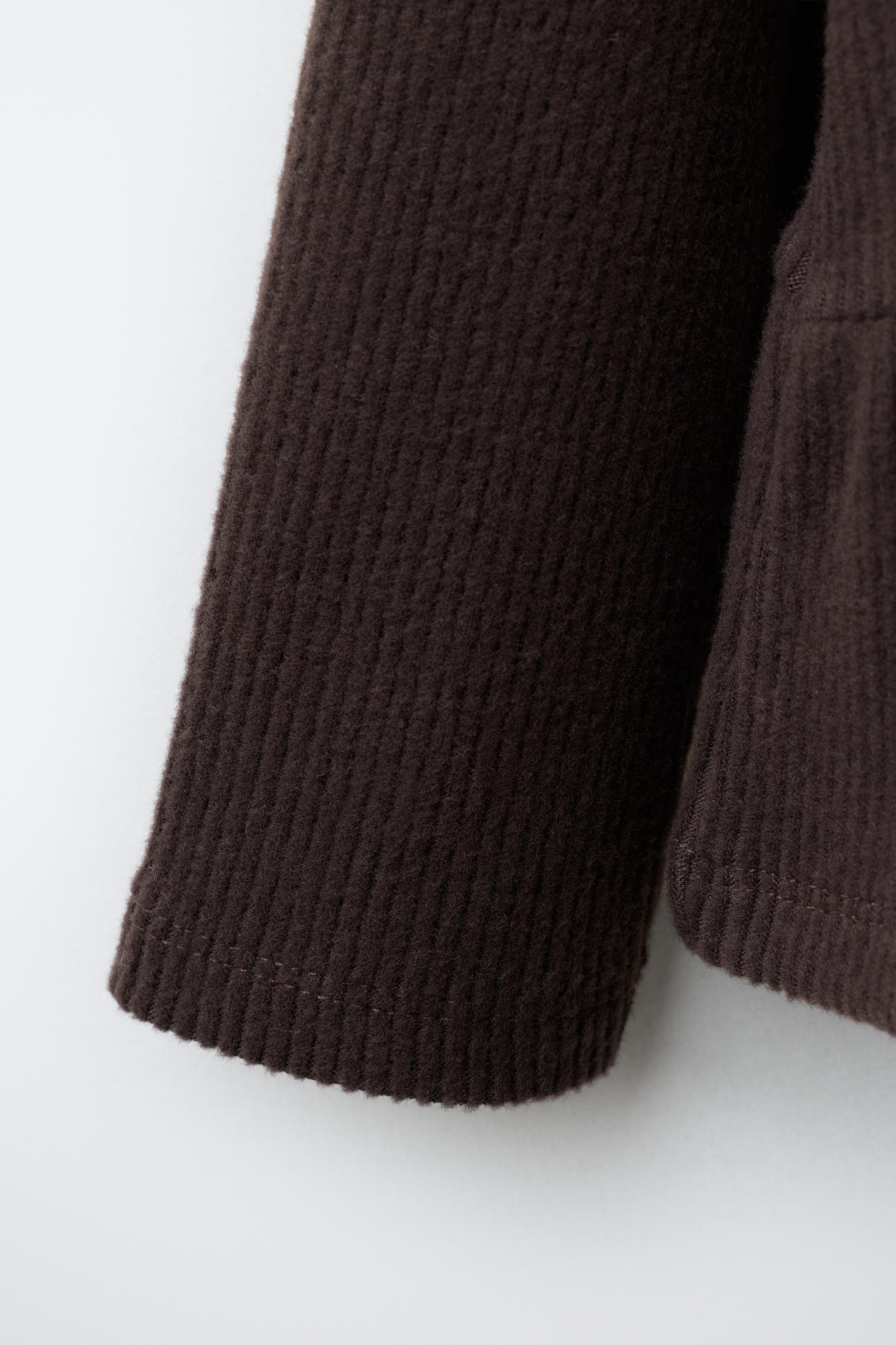 HAUT CANNELÉ SOFT TOUCH PÉPLUM LACETS