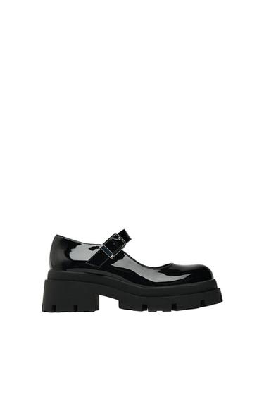 TRACK-SOLE MARY JANES WITH BUCKLE