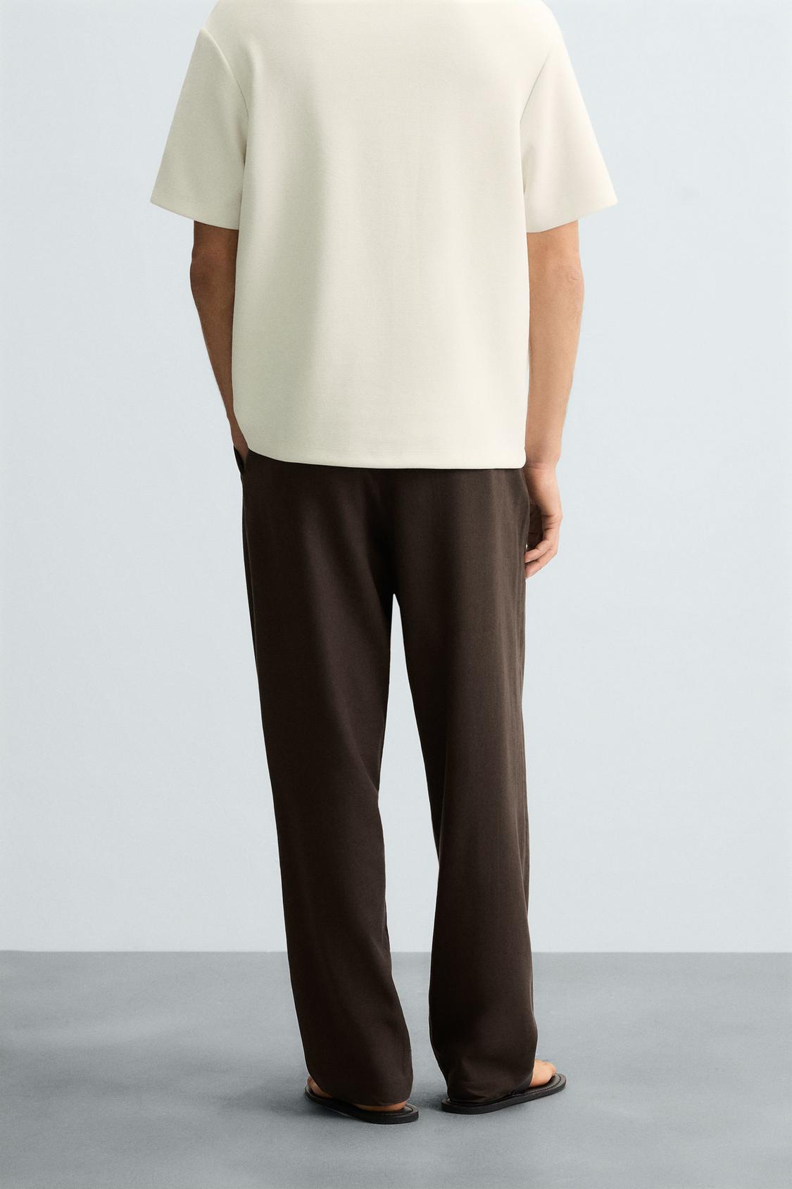 FLOWY PLEATED PANTS