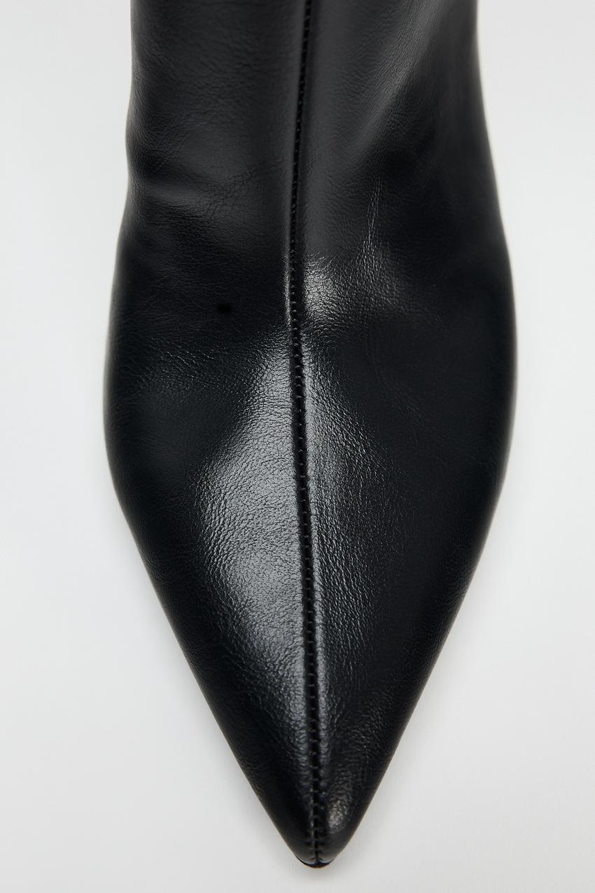 STITCHED DETAIL HEELED BOOTS