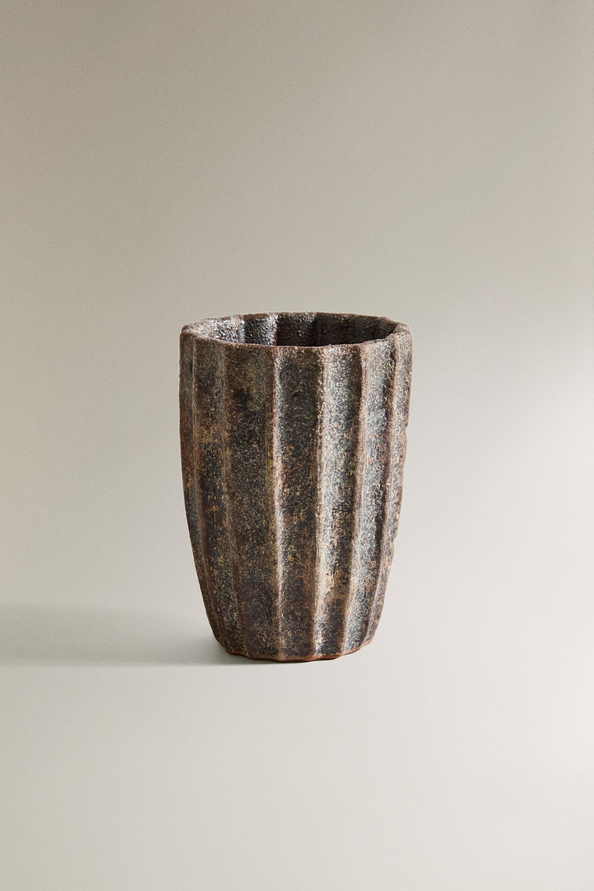 TERRACOTTA RAISED DESIGN TOOTHBRUSH HOLDER