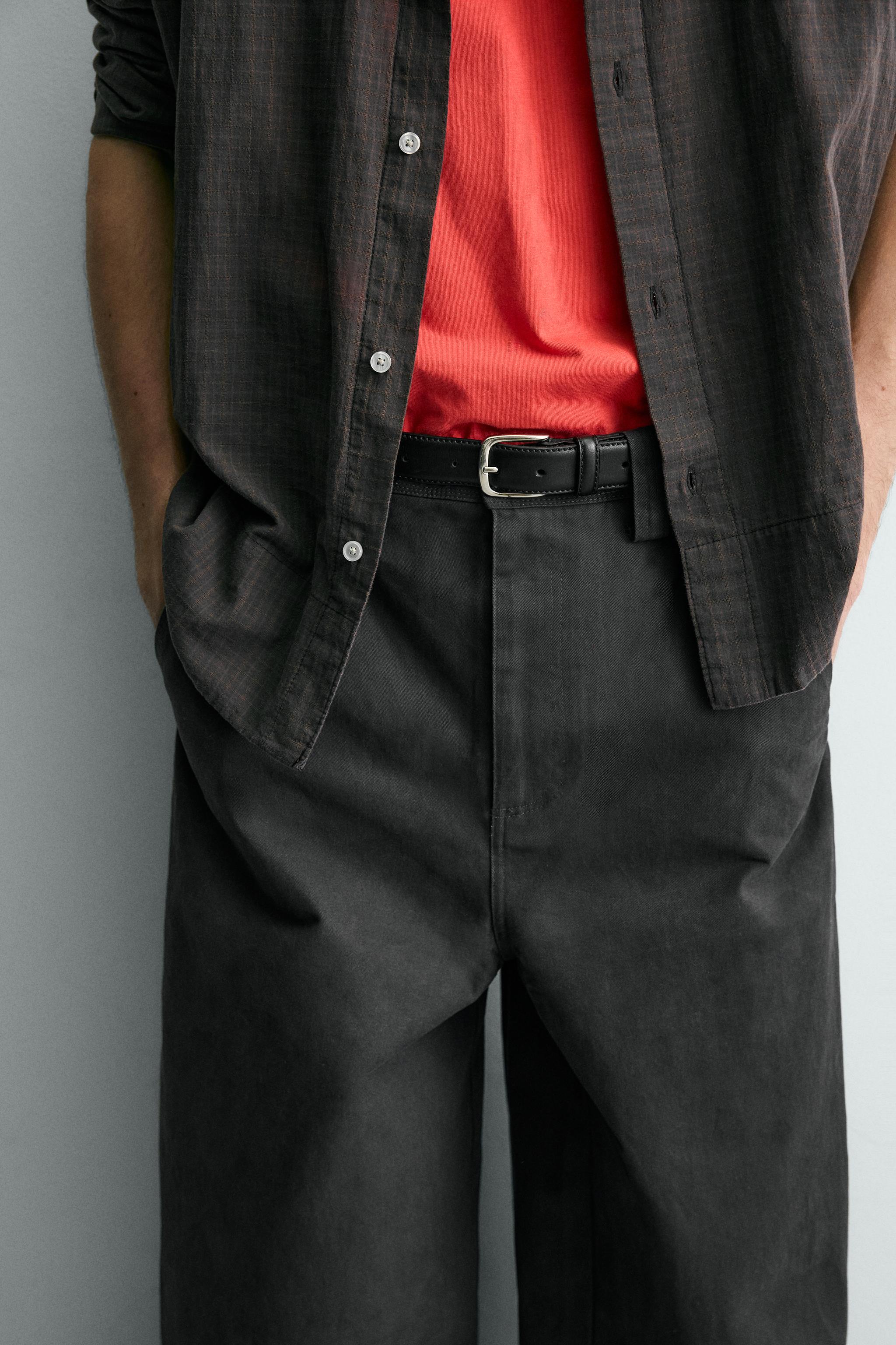 RELAXED FIT PANTS WITH TWISTED SEAM