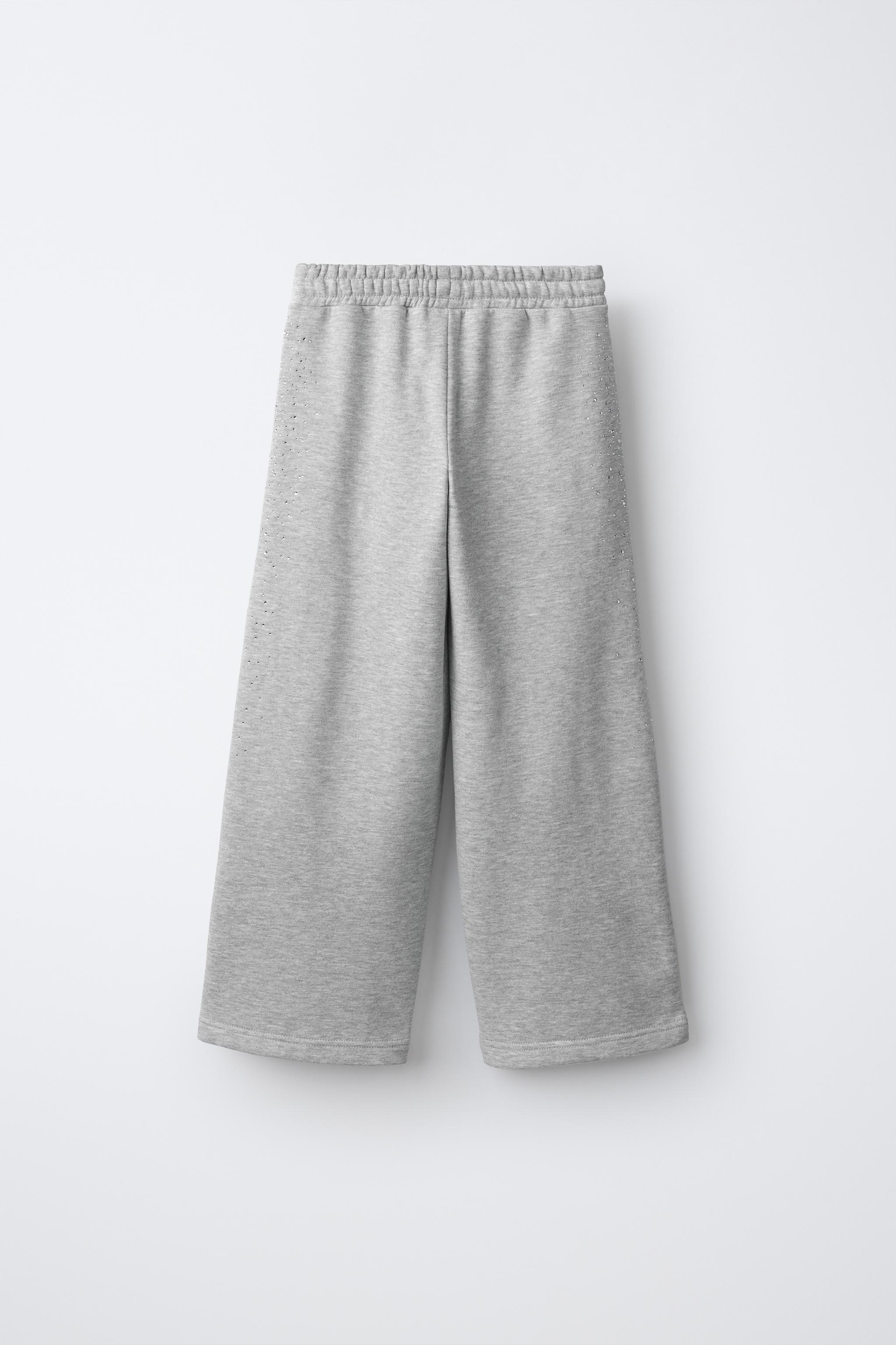 PANTALON À JAMBES LARGES DÉCOR STRASS