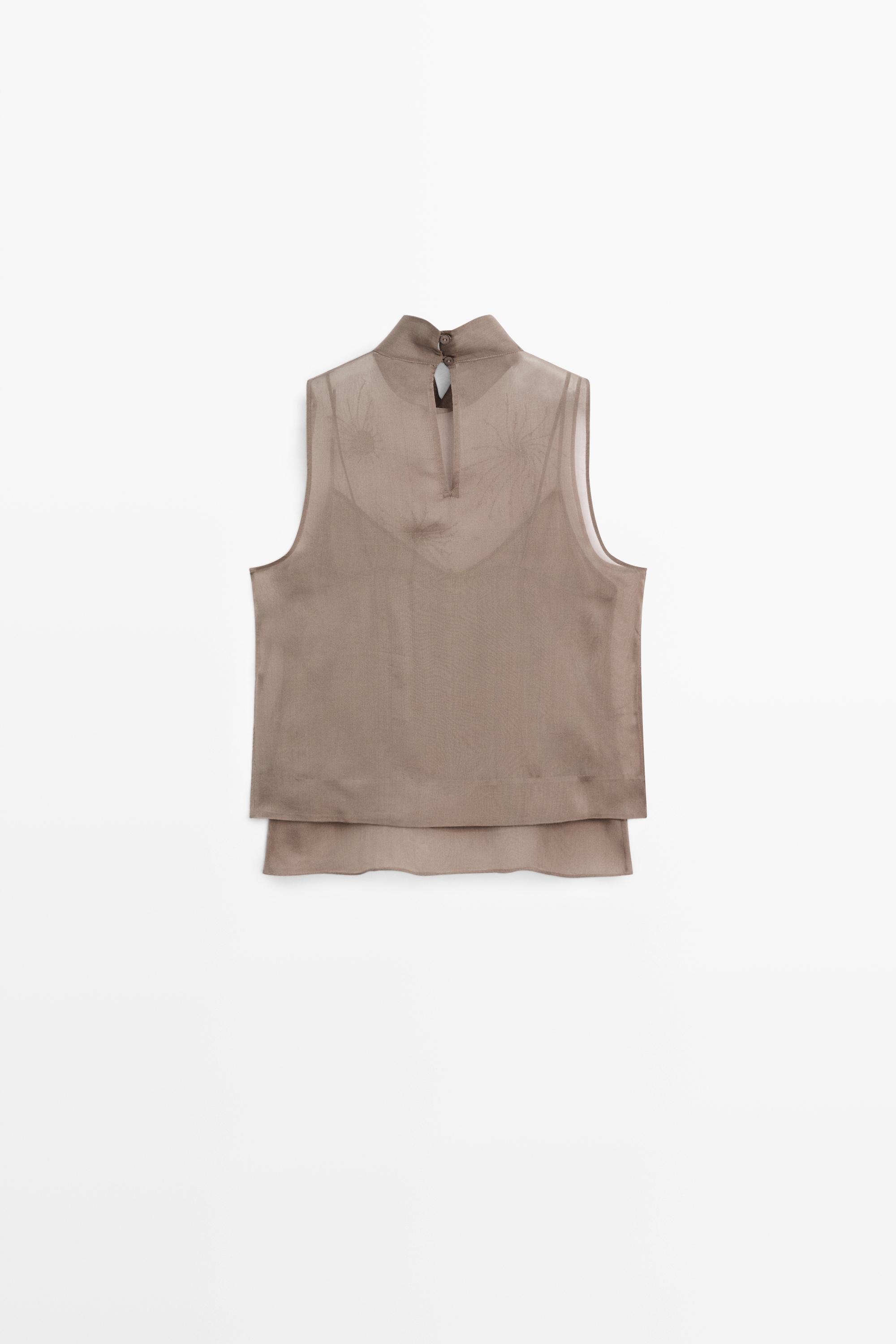 Semi-sheer top with embroidered detail