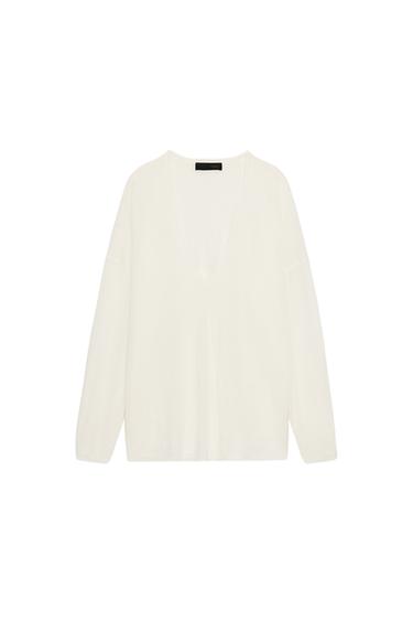 سترة بغرزة رفيعة بياقة على شكل V - أبيض by Zara