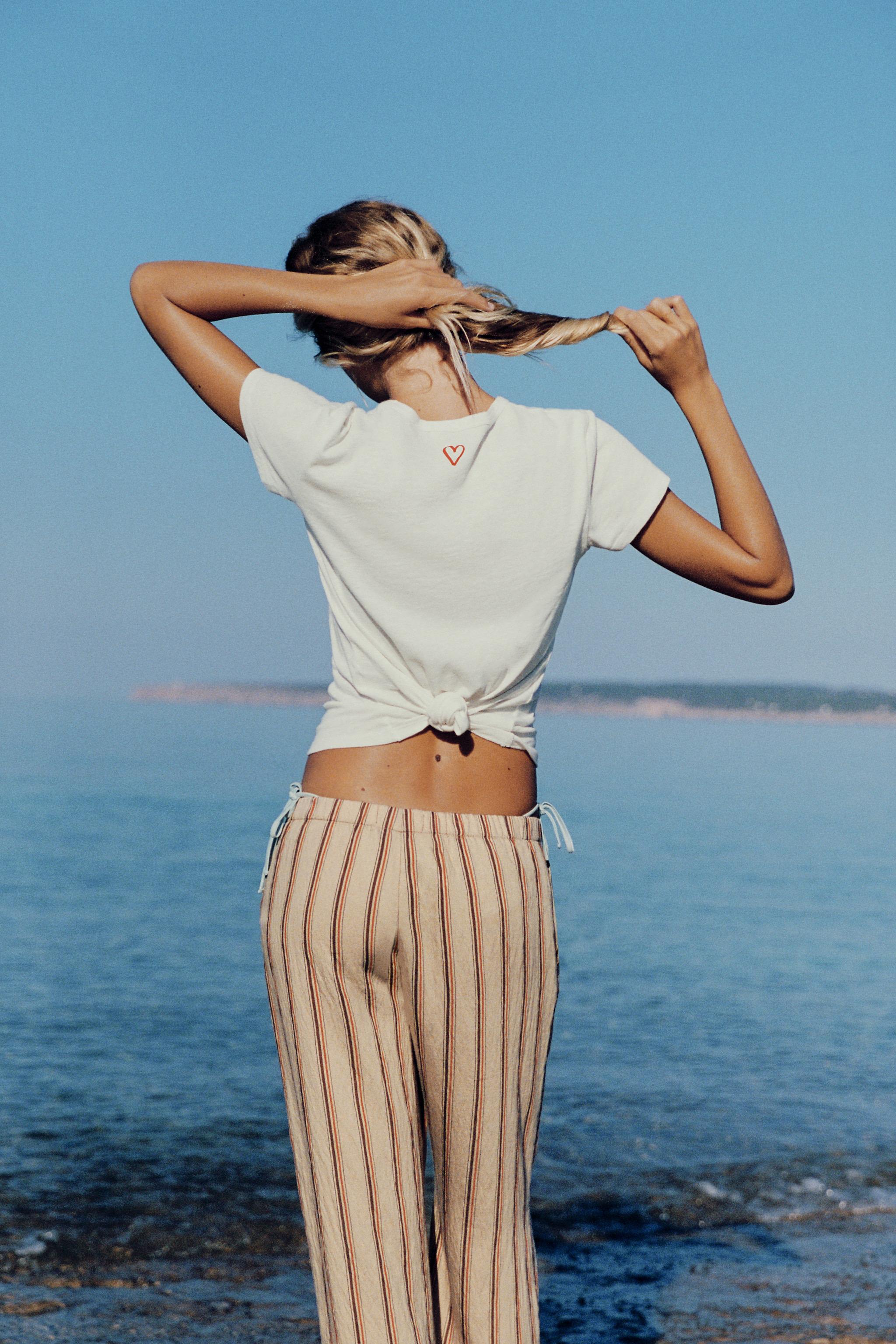 STRIPED FLOWY PANTS — Beige-brown