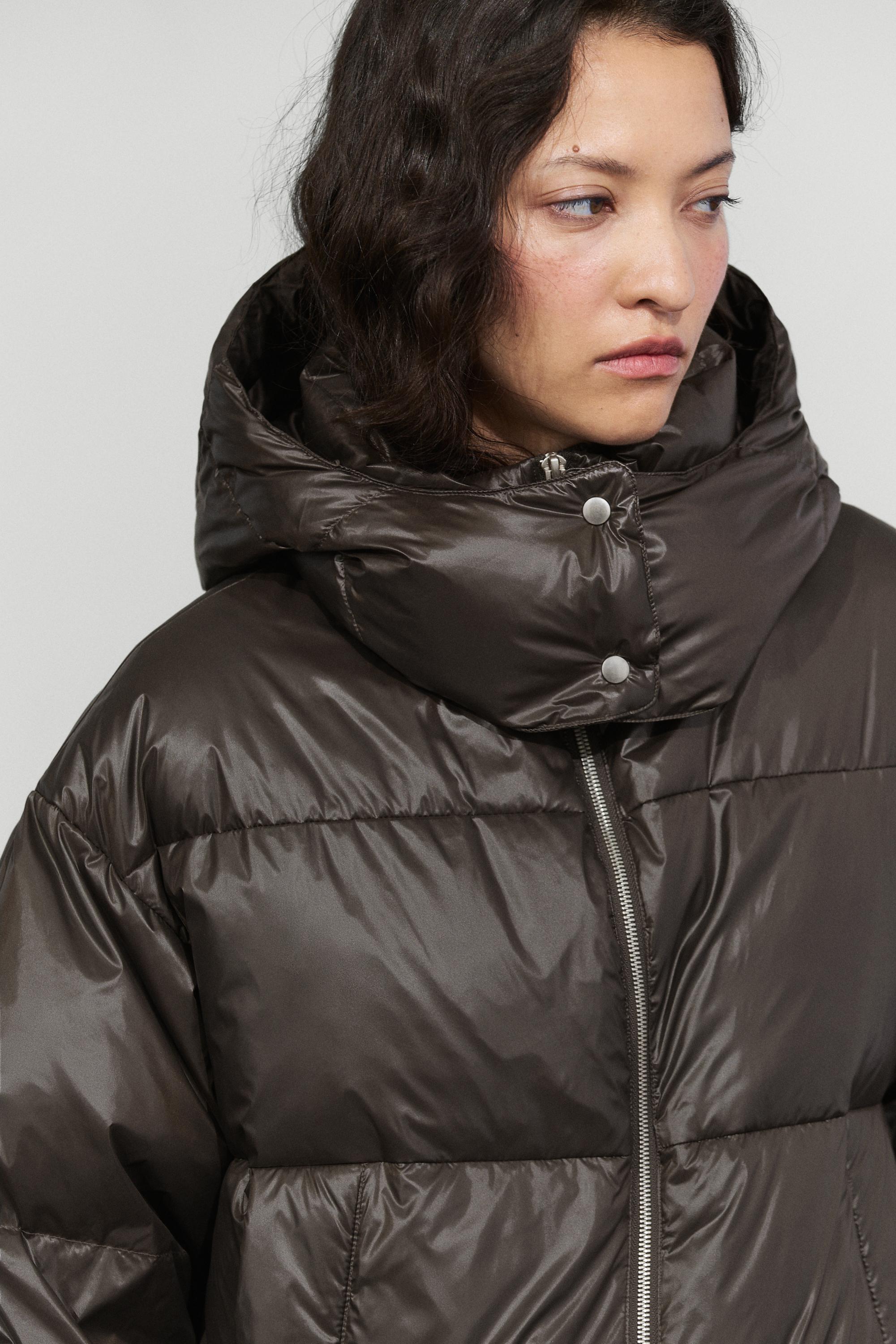 Down jacket with mitten detail