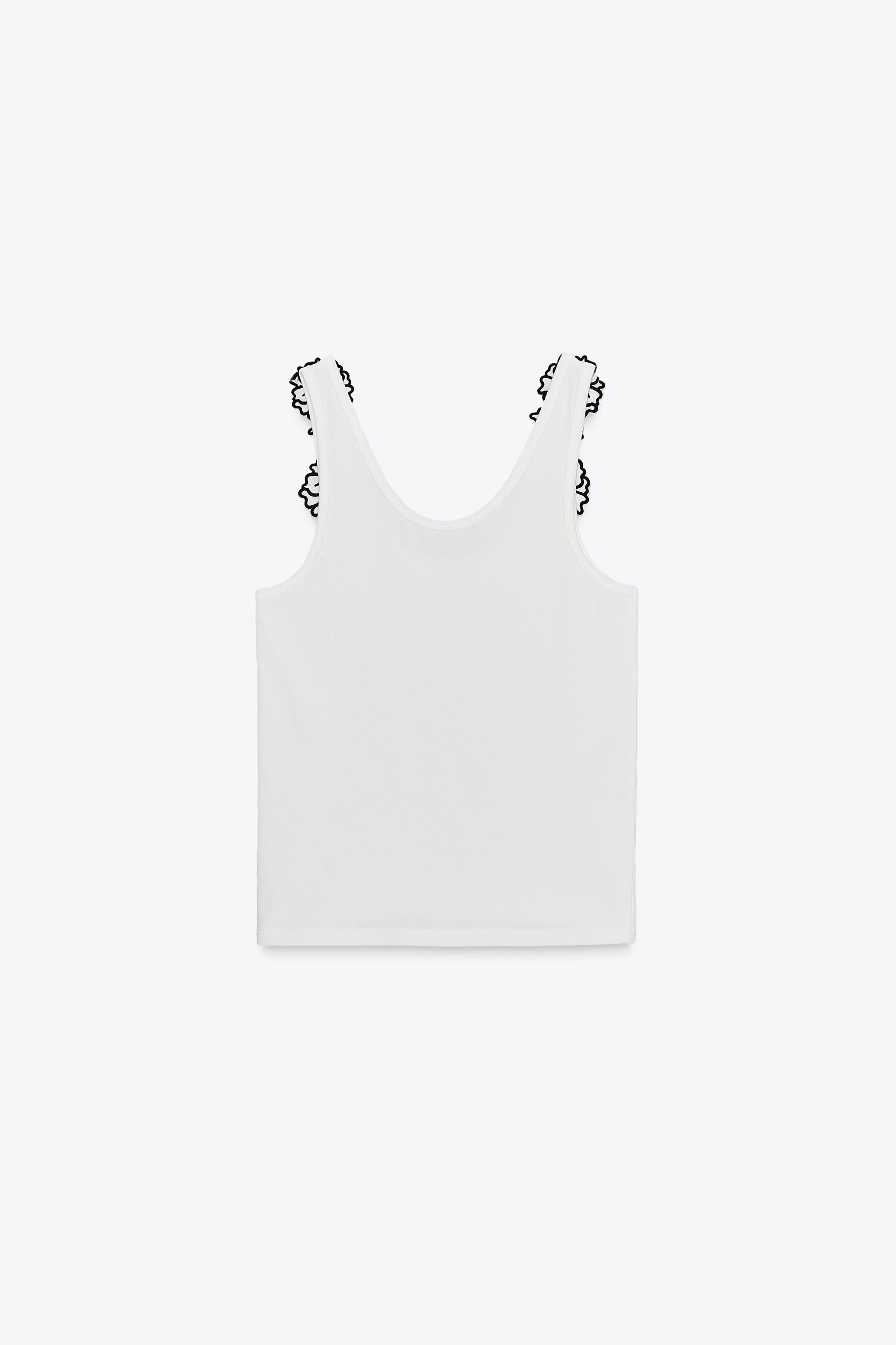 TOP AVEC APPLIQUES FLEURS